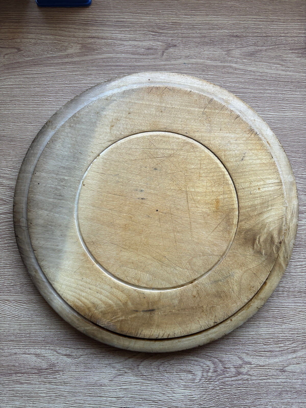 Old wooden carved bread board