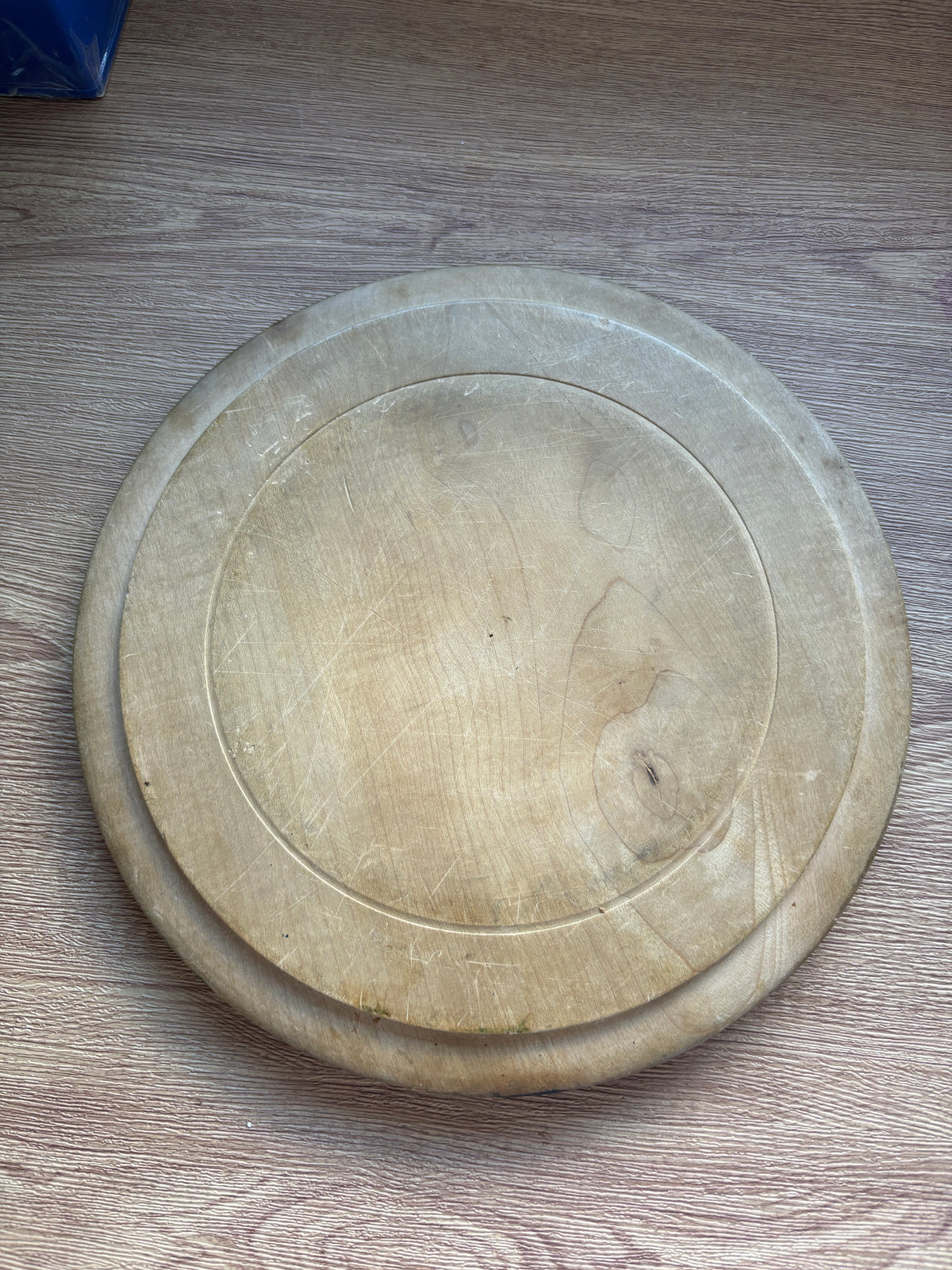 Old wooden carved bread board