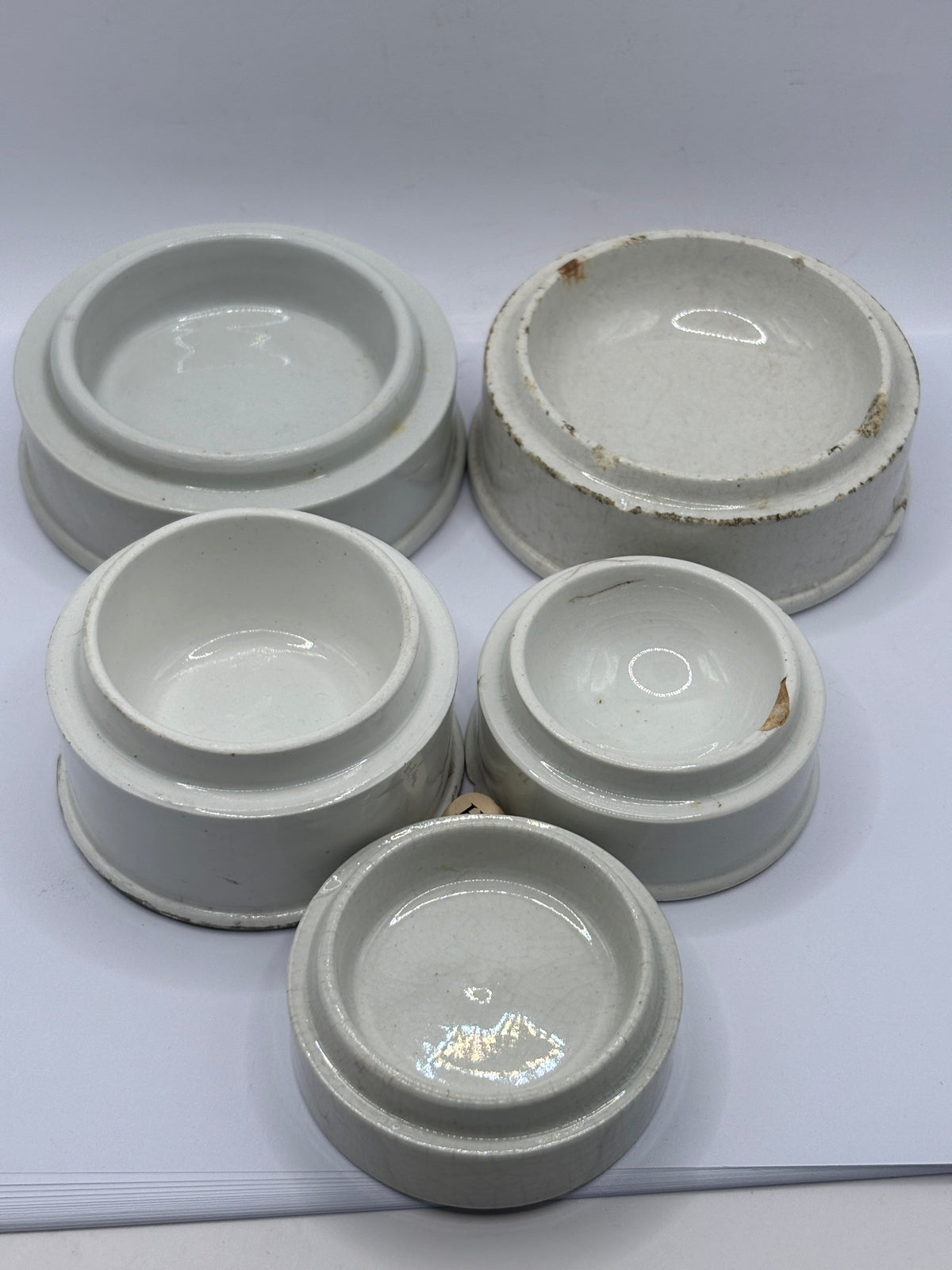 5 old stoneware pot lid bases, stackers (H)