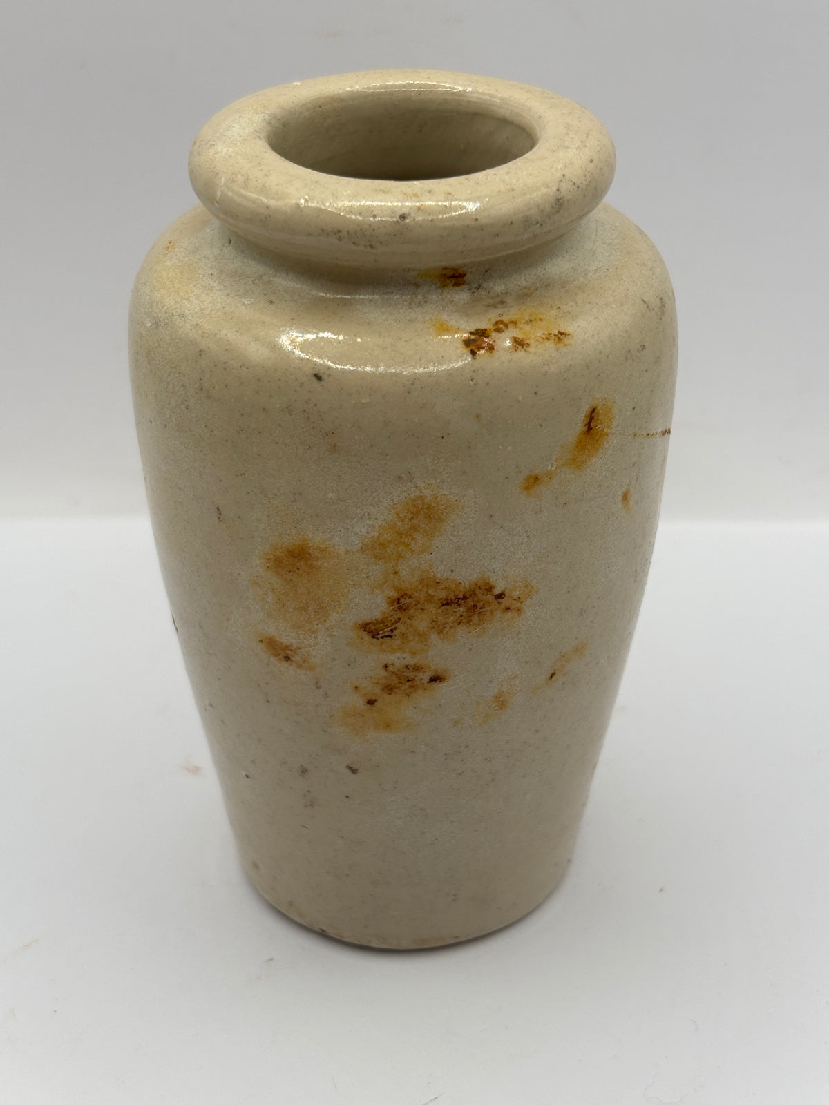 Old stained stoneware cream pot