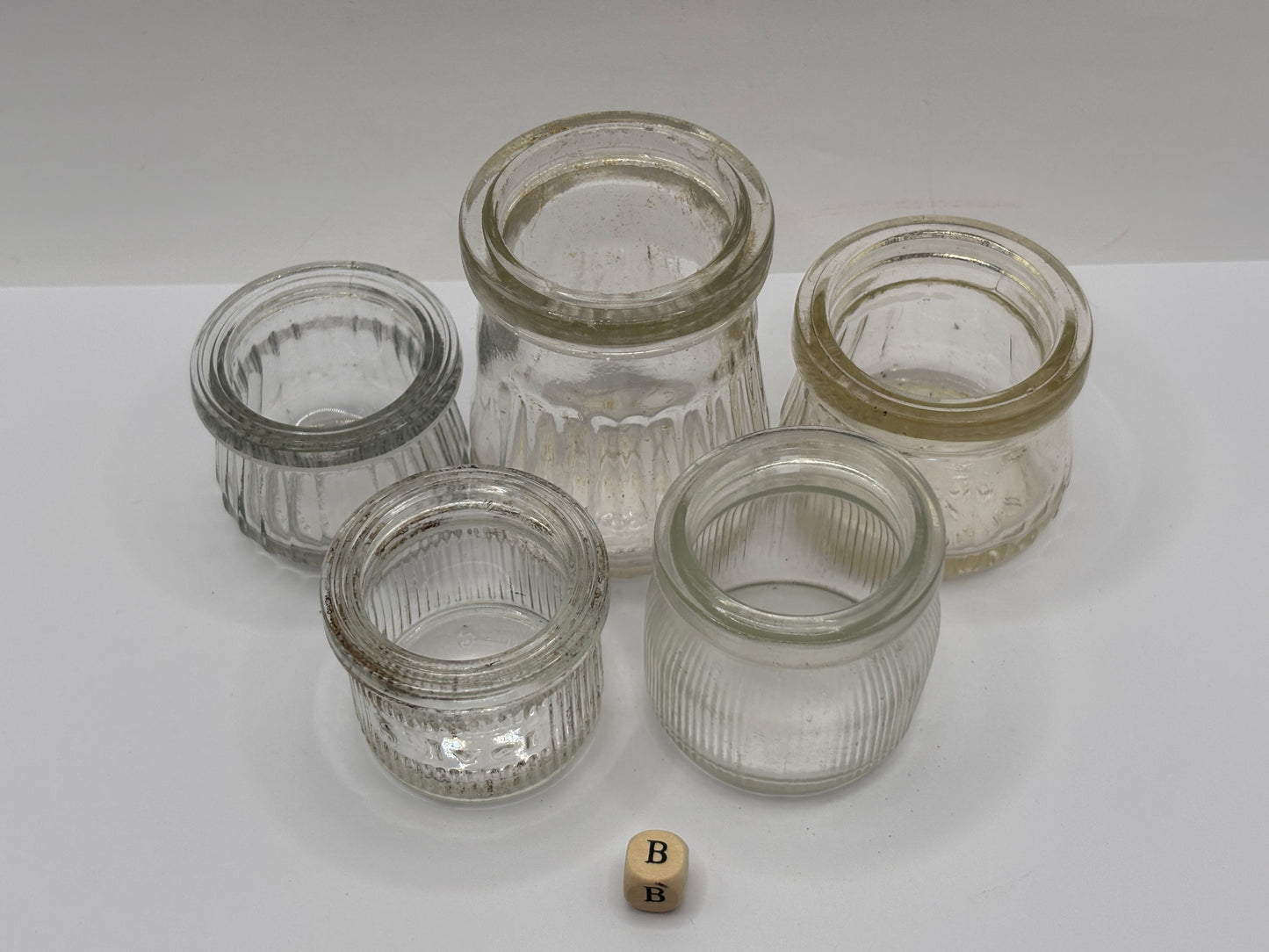 5 old clear glass meat paste jars (B)