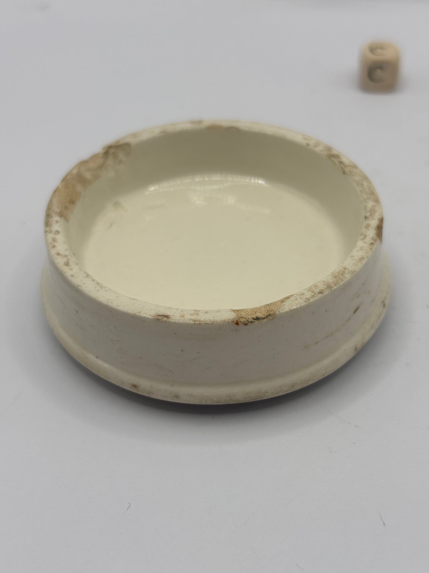 old advertising lid, Woods areca nut toothpaste (C)