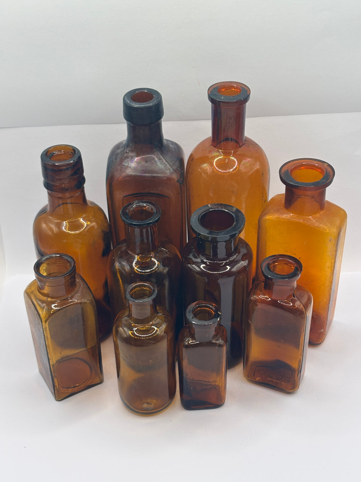 10 Old amber glass chemist bottles
