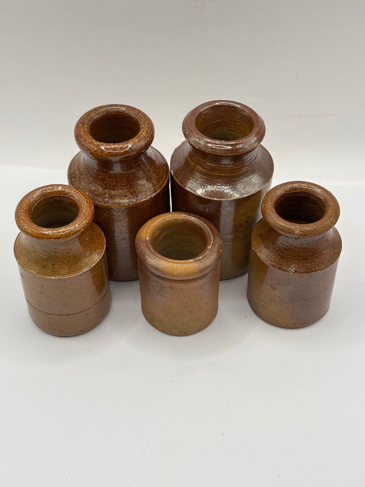 5 old small brown stoneware jars