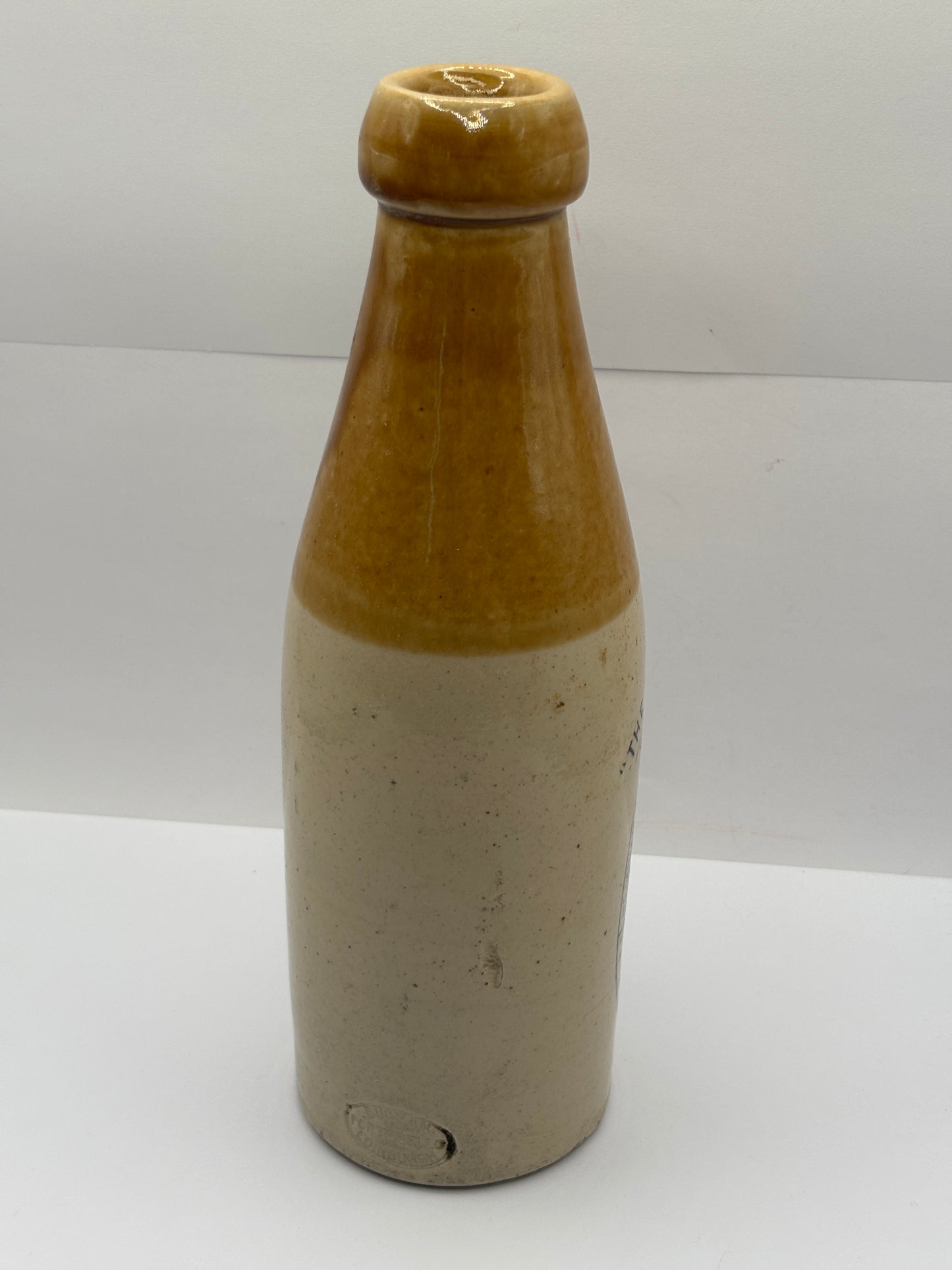 Old stoneware stout bottle, The Doctors stout, Ross & Co. Hairline