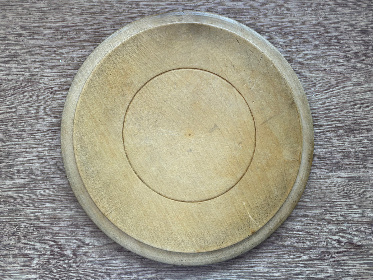 Old wooden carved bread board