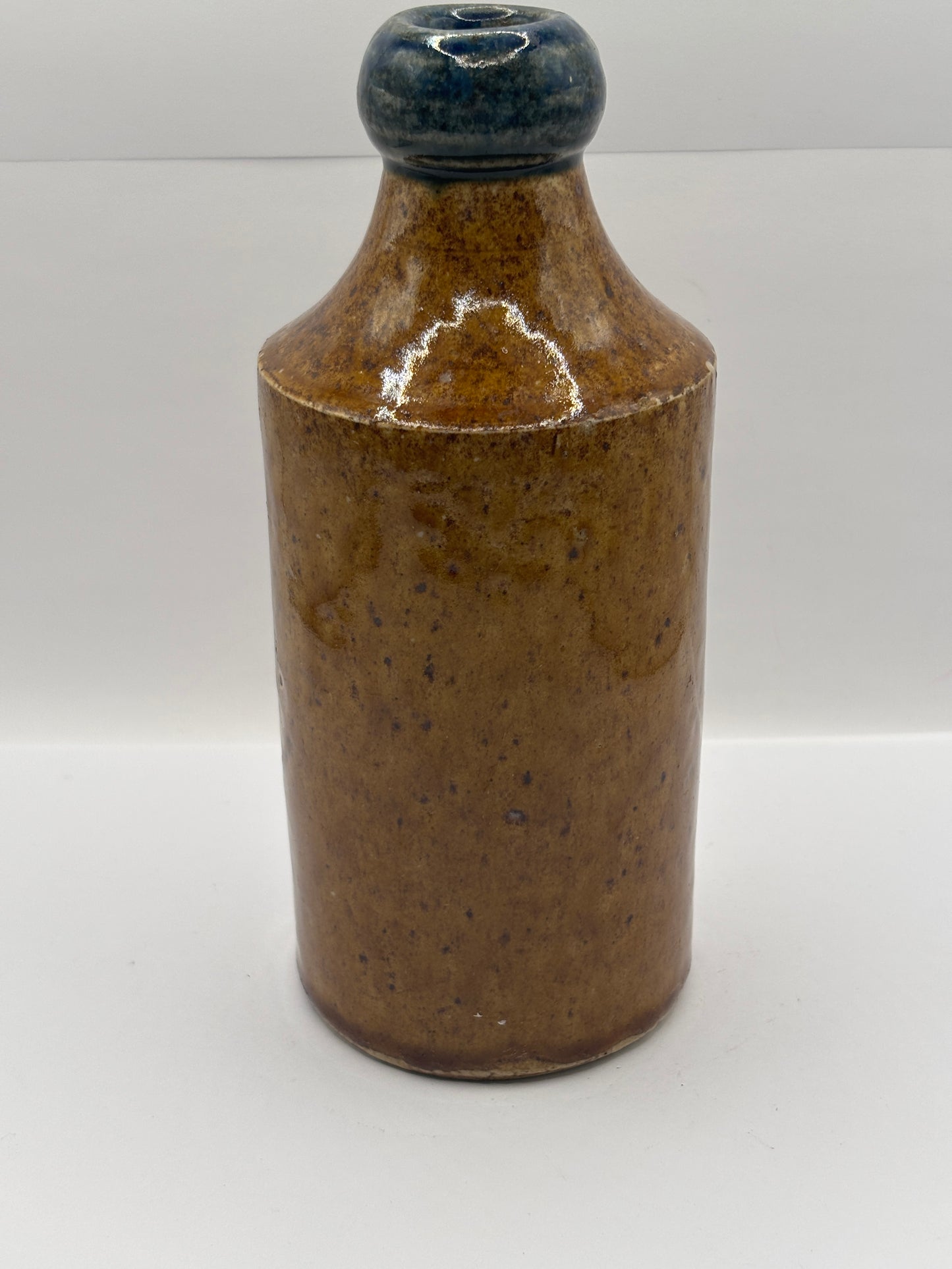 Old Blue top impressed stoneware ginger beer bottle, Manchester