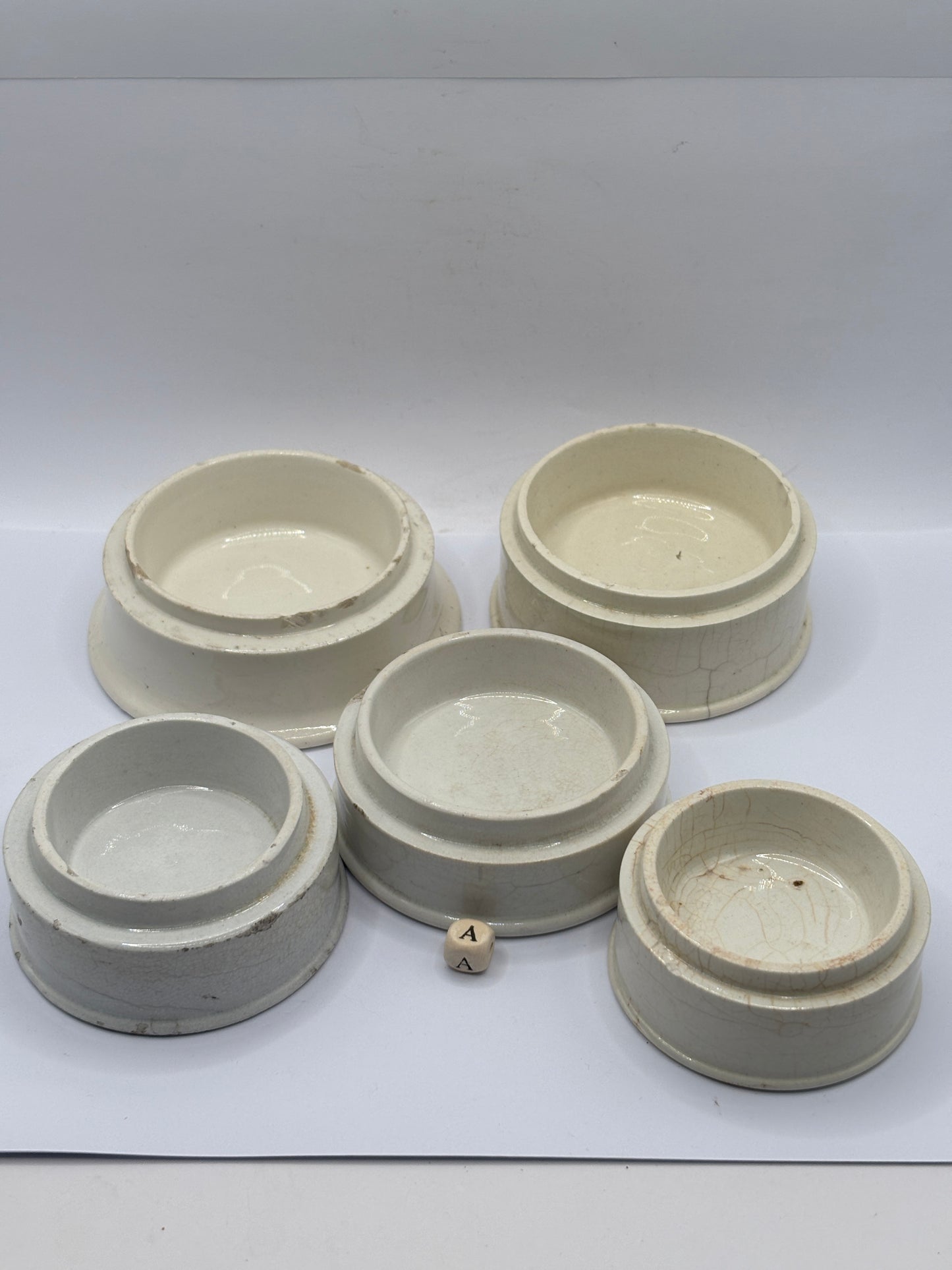 5 old stoneware bases, stackers (a) damages