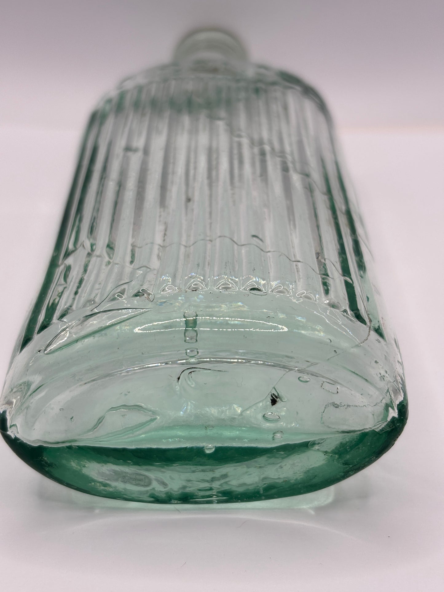 Old aqua glass poison bottle, Poisonous