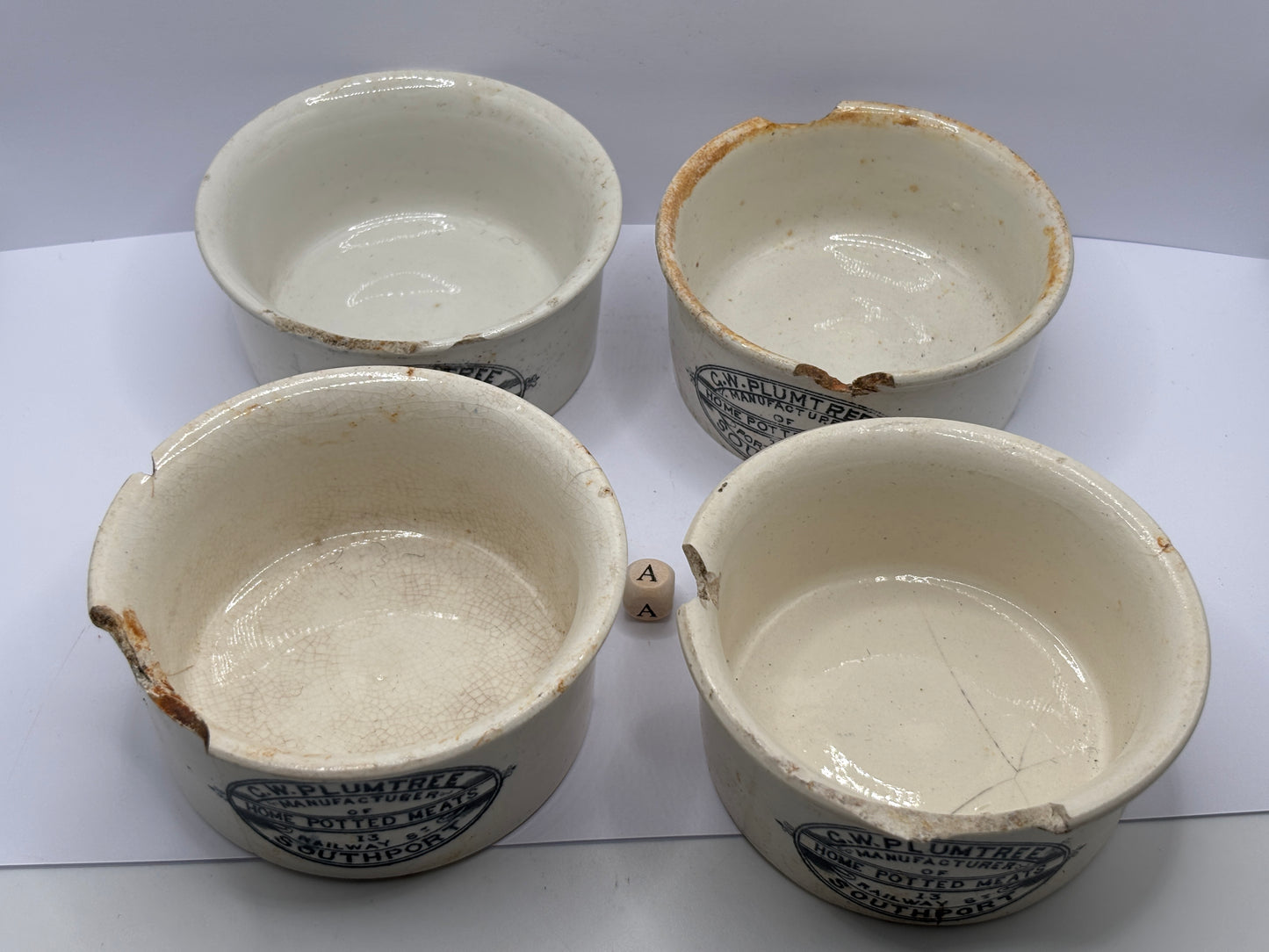 4 old advertising meat paste pots (a) damaged