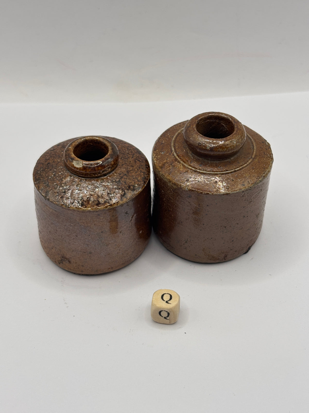 2 old brown stoneware ink bottles, inks. Pork pie ink (Q)