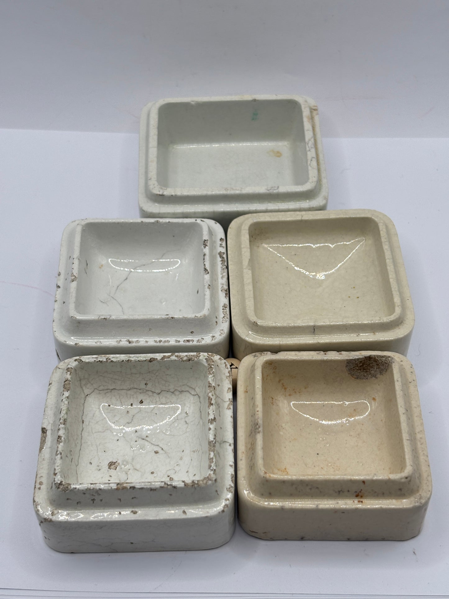 5 old square bases, stackers (K) damages