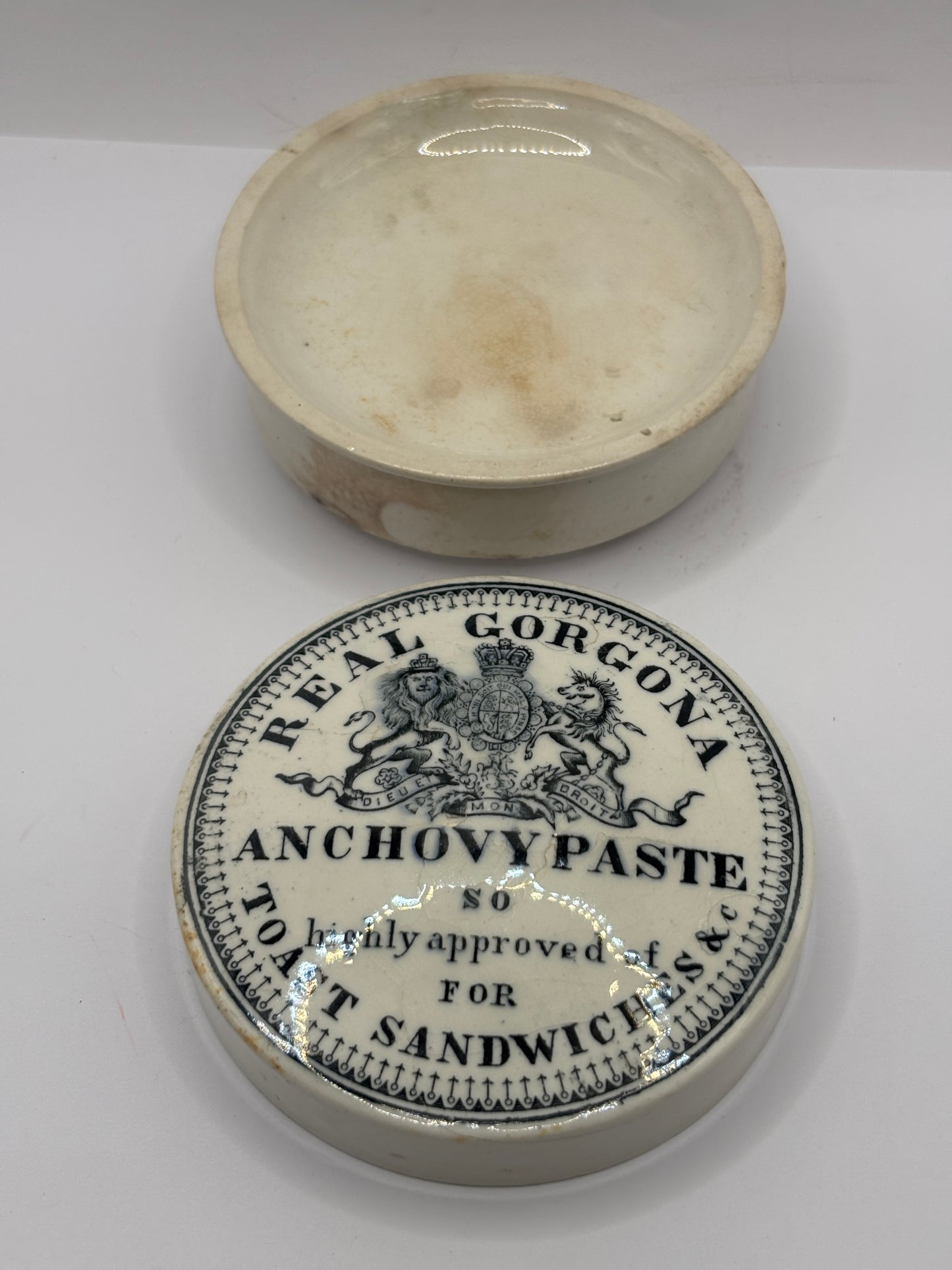 Old advertising lid and base. Real Gorgona anchovy paste. Chipped