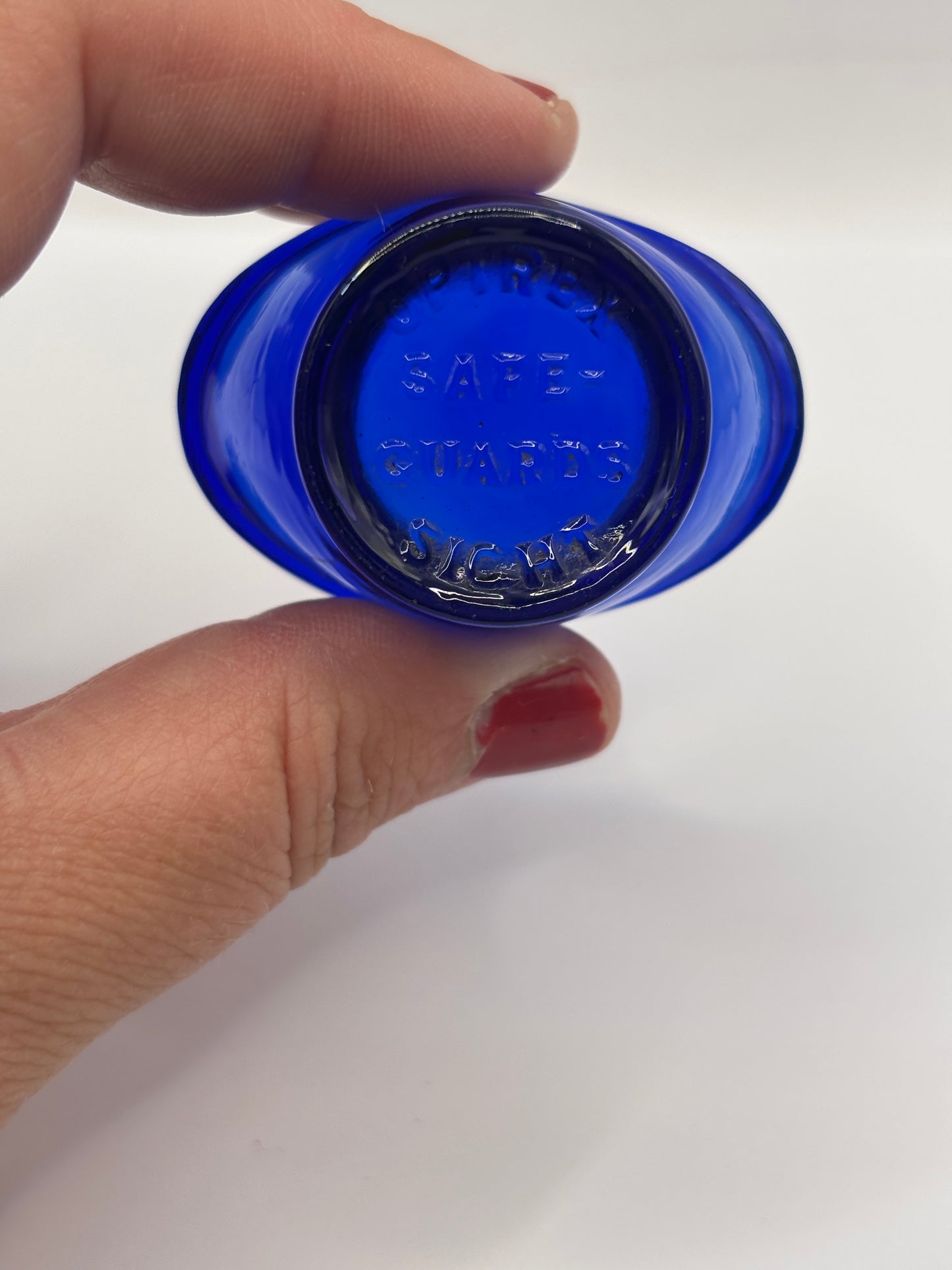 Old blue glass eye bath, eye wash