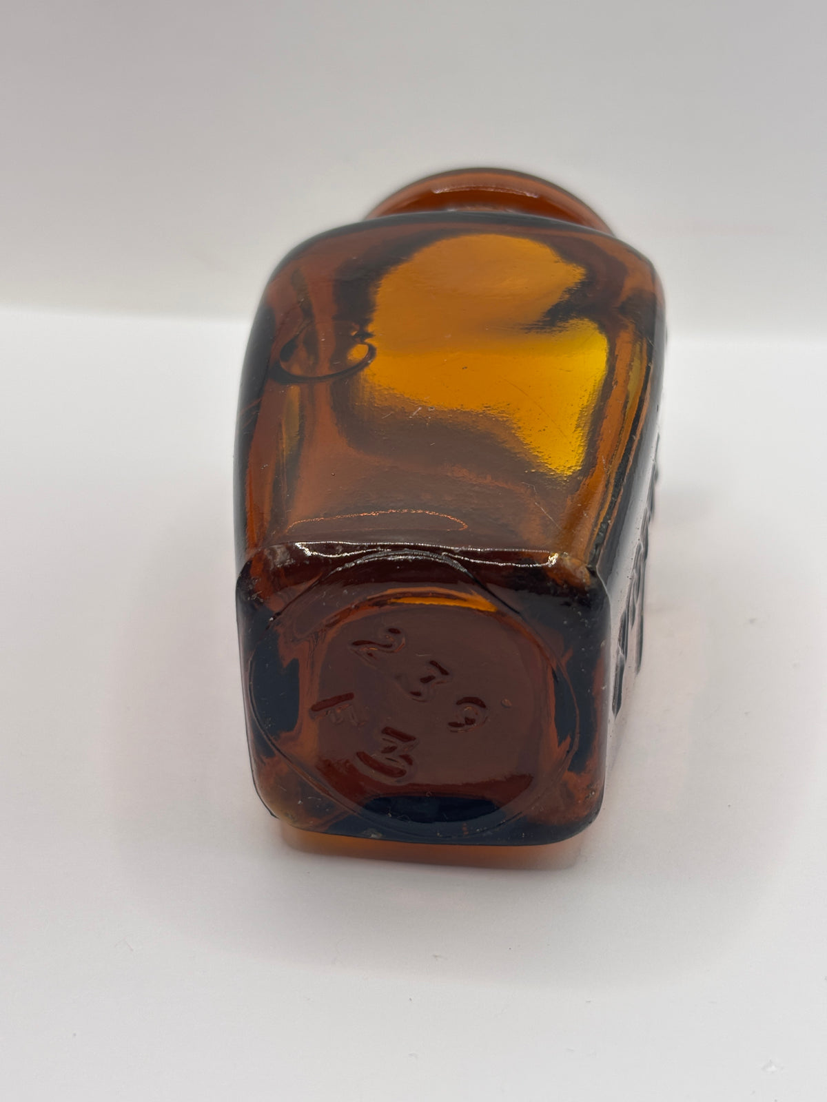 Old amber glass Virolax jar