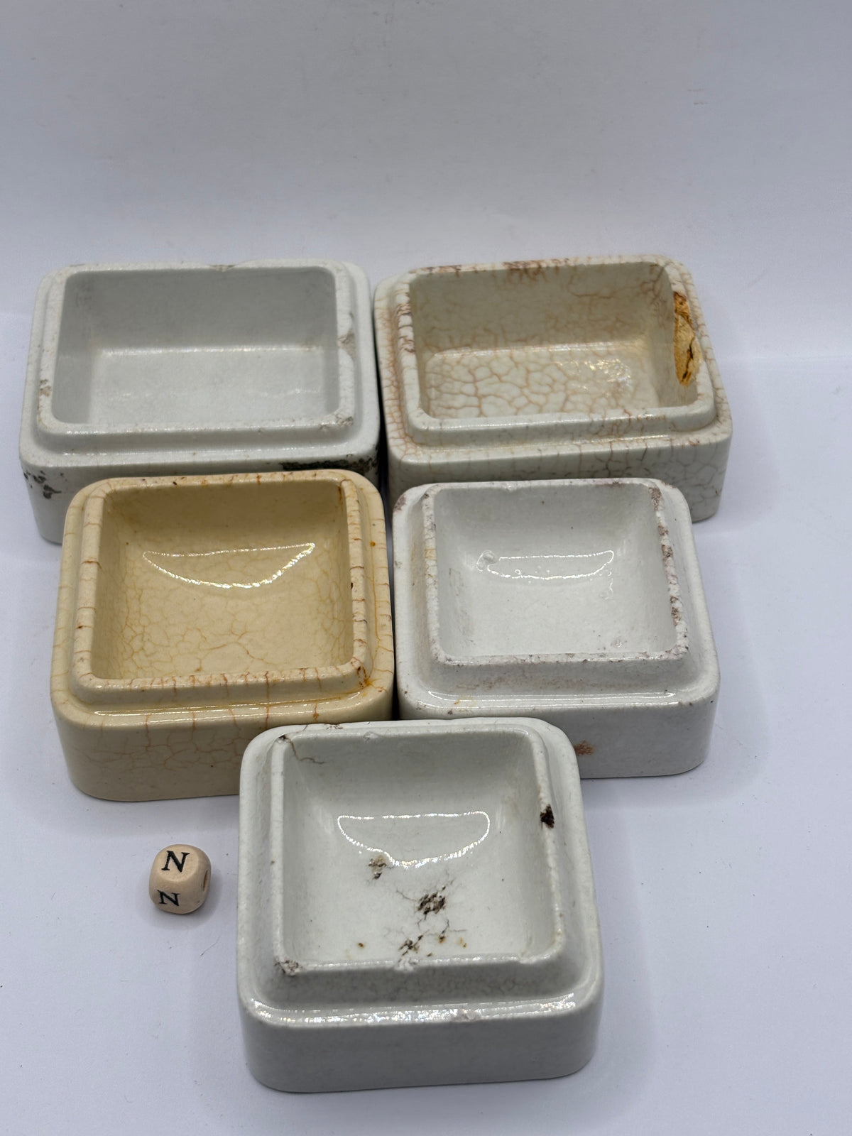5 old square stoneware pot lid bases, stackers