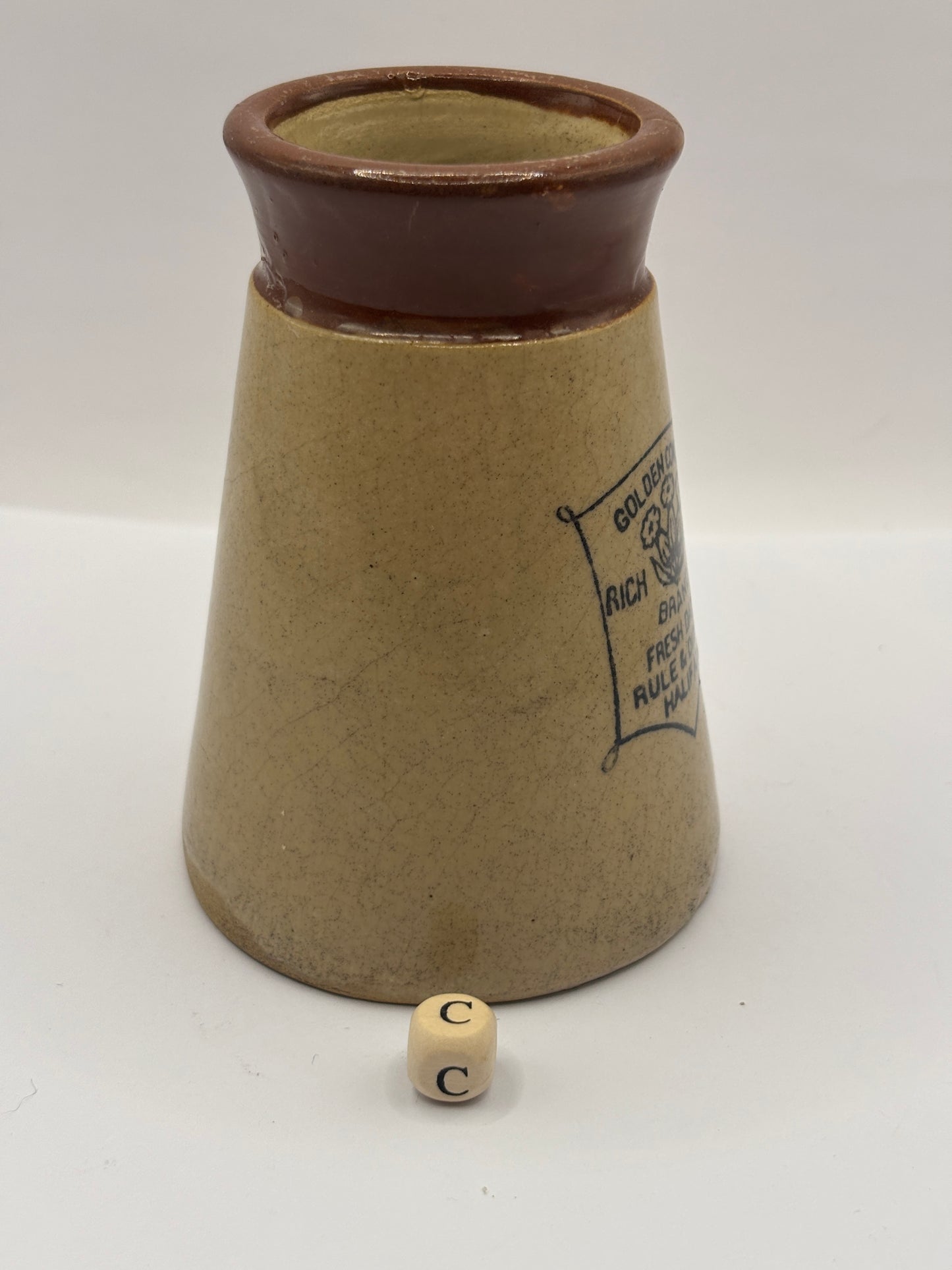 Old advertising cream pot, Cowslip (c) repaired/damaged