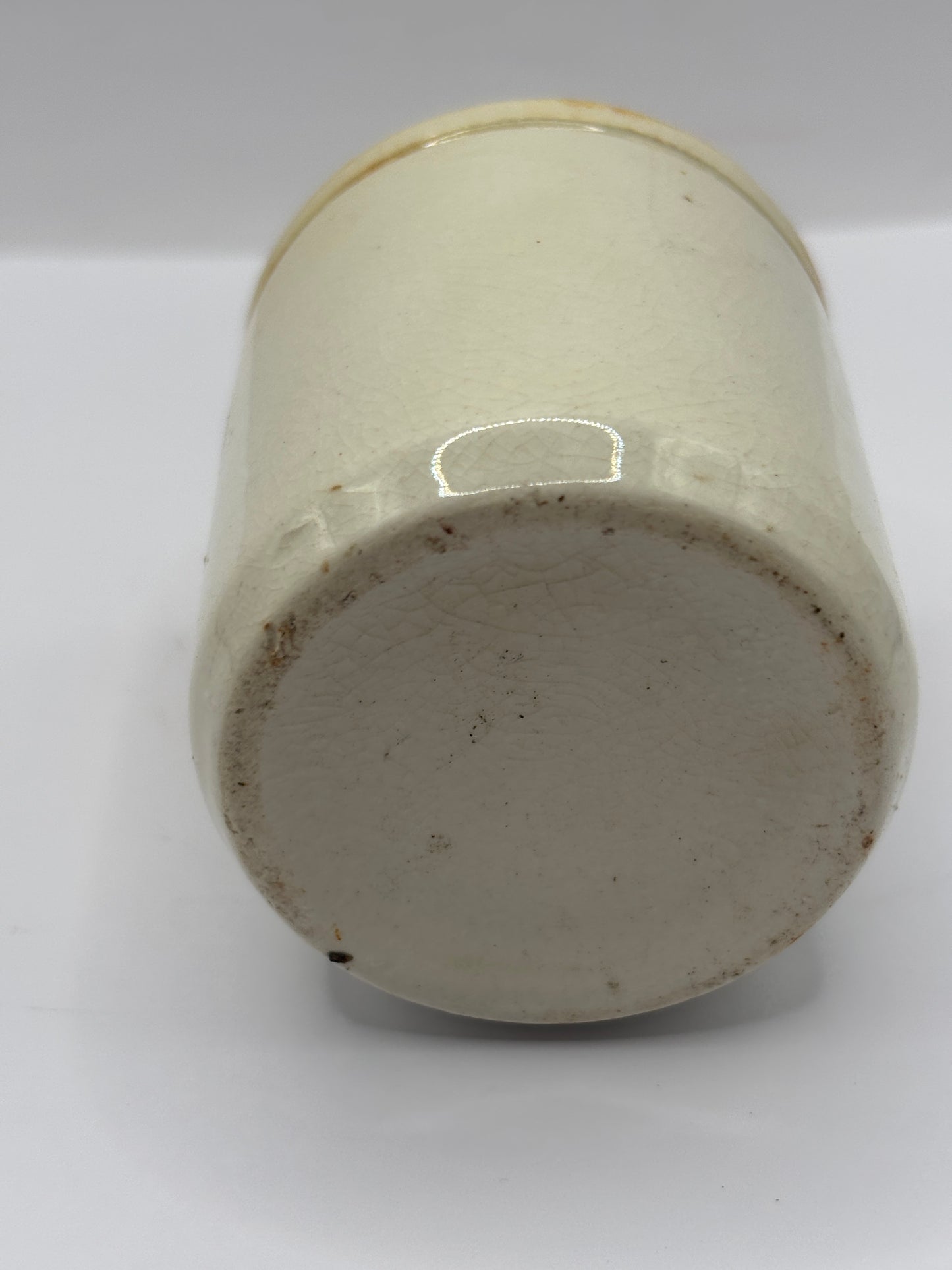 Old white stoneware jar