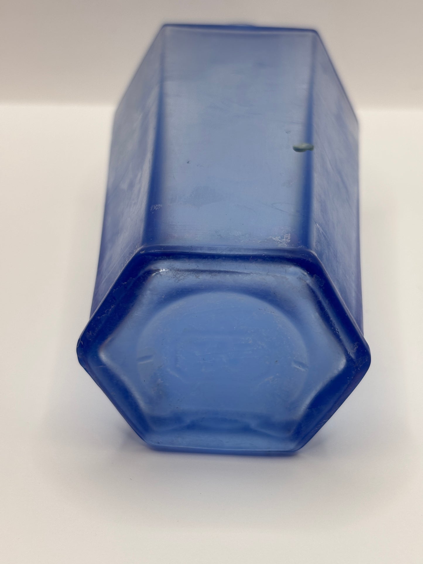 Old unusual blue glass bottle. 6 sided