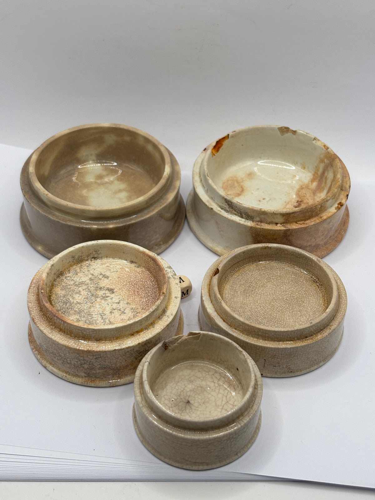 5 old stoneware pot lid bases, stackers (m)