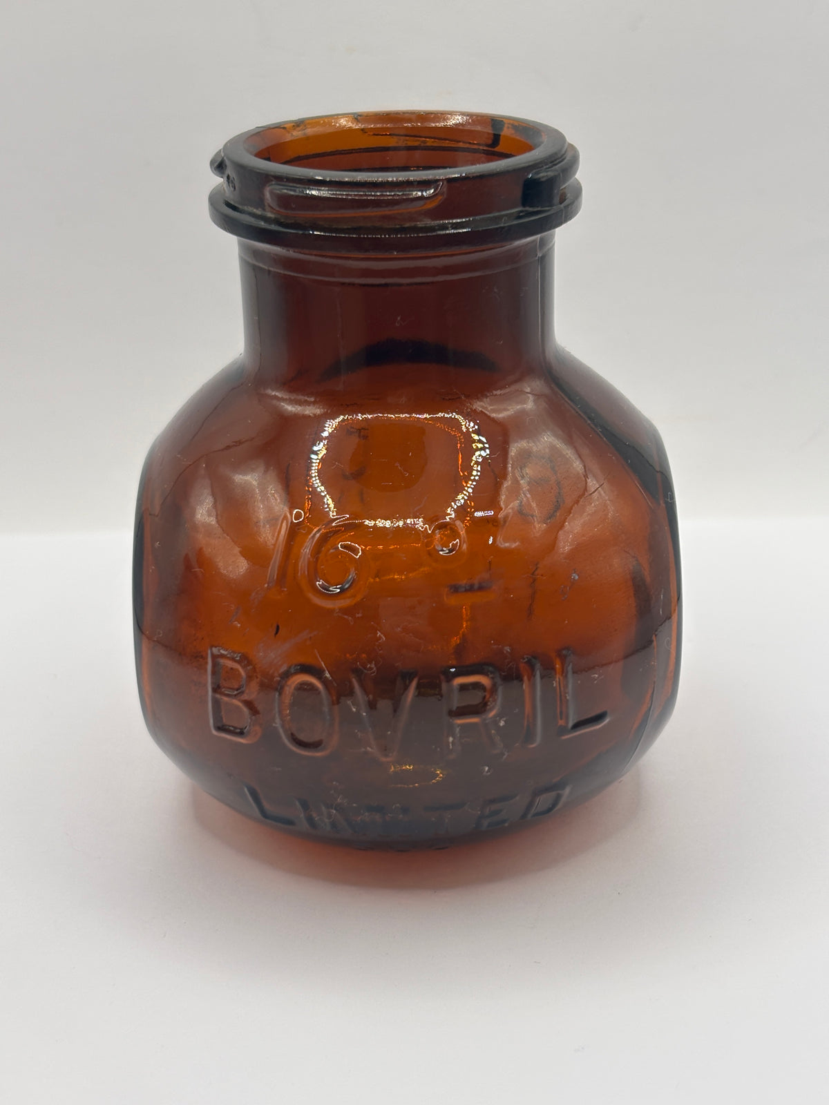 Old 16oz amber glass advertising Bovril bottle