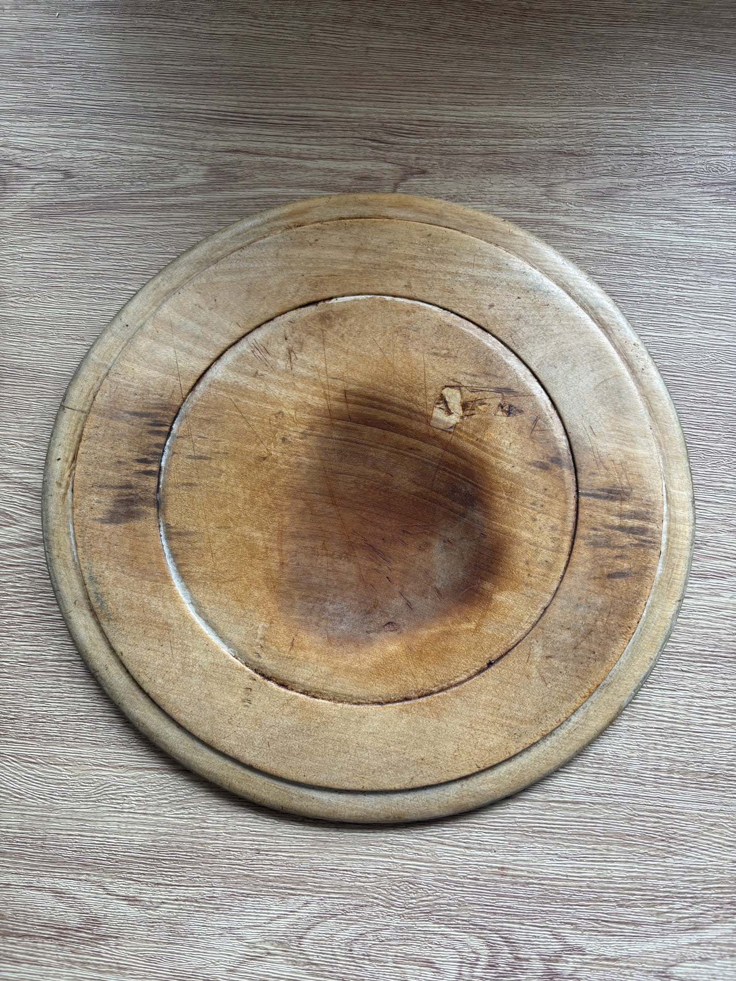 Old wooden carved bread board