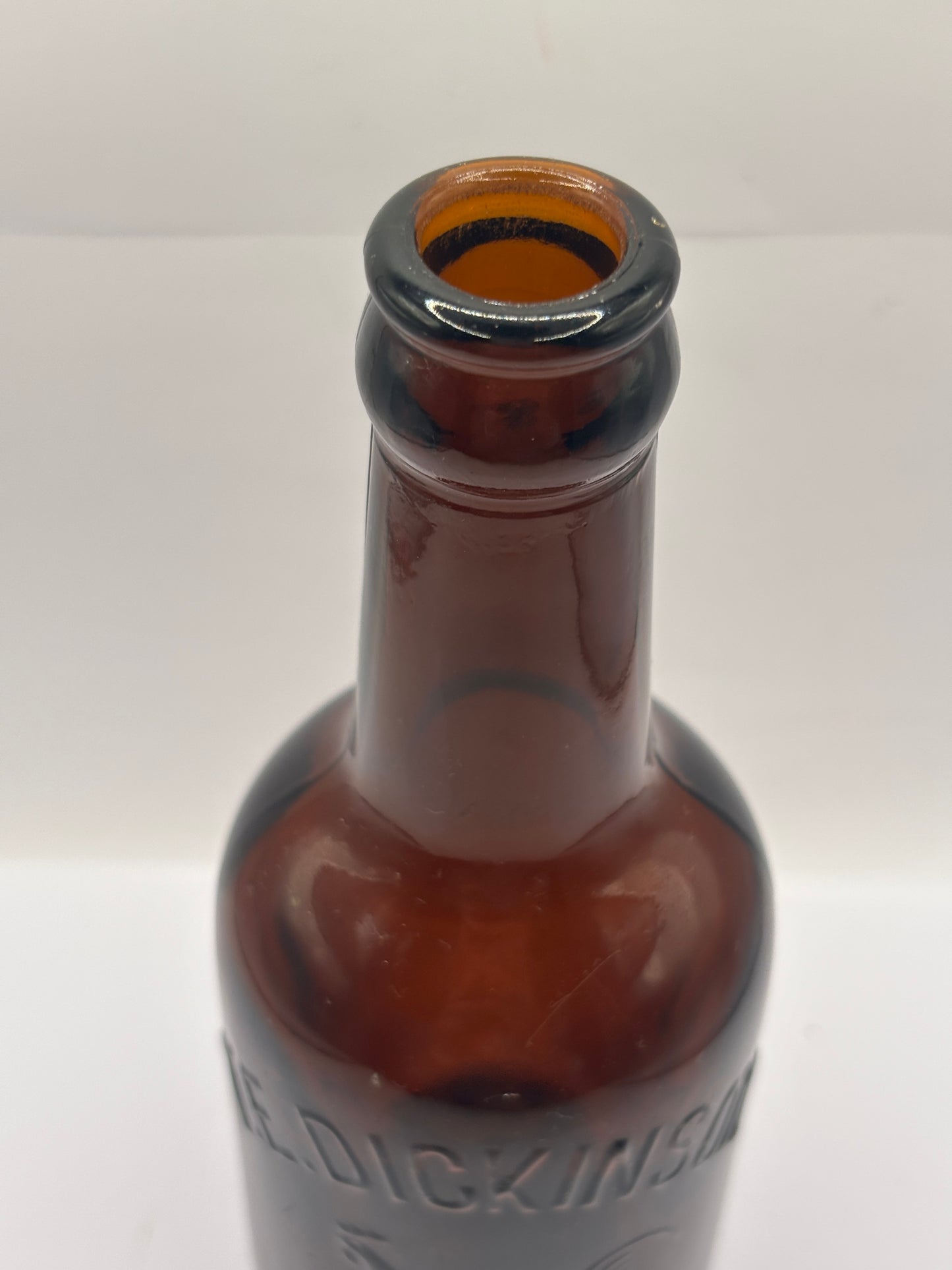 Old advertising glass beer bottle, Huddersfield