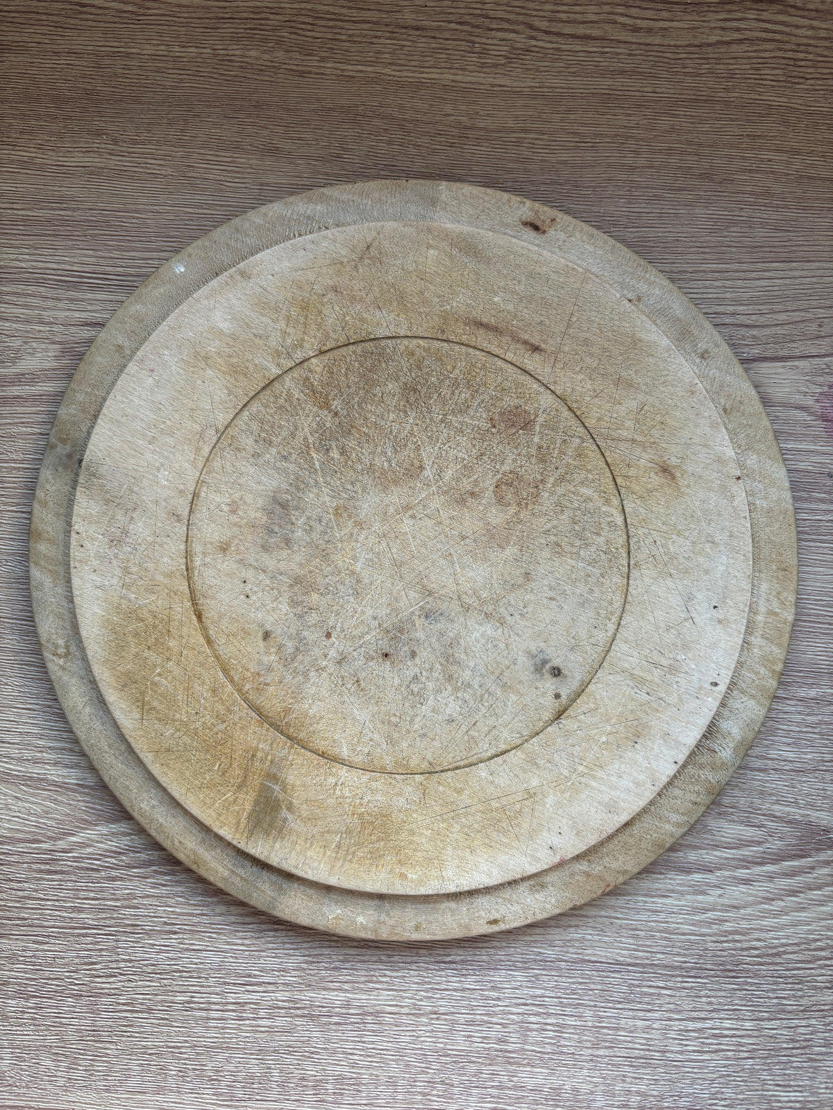 Old wooden carved bread board