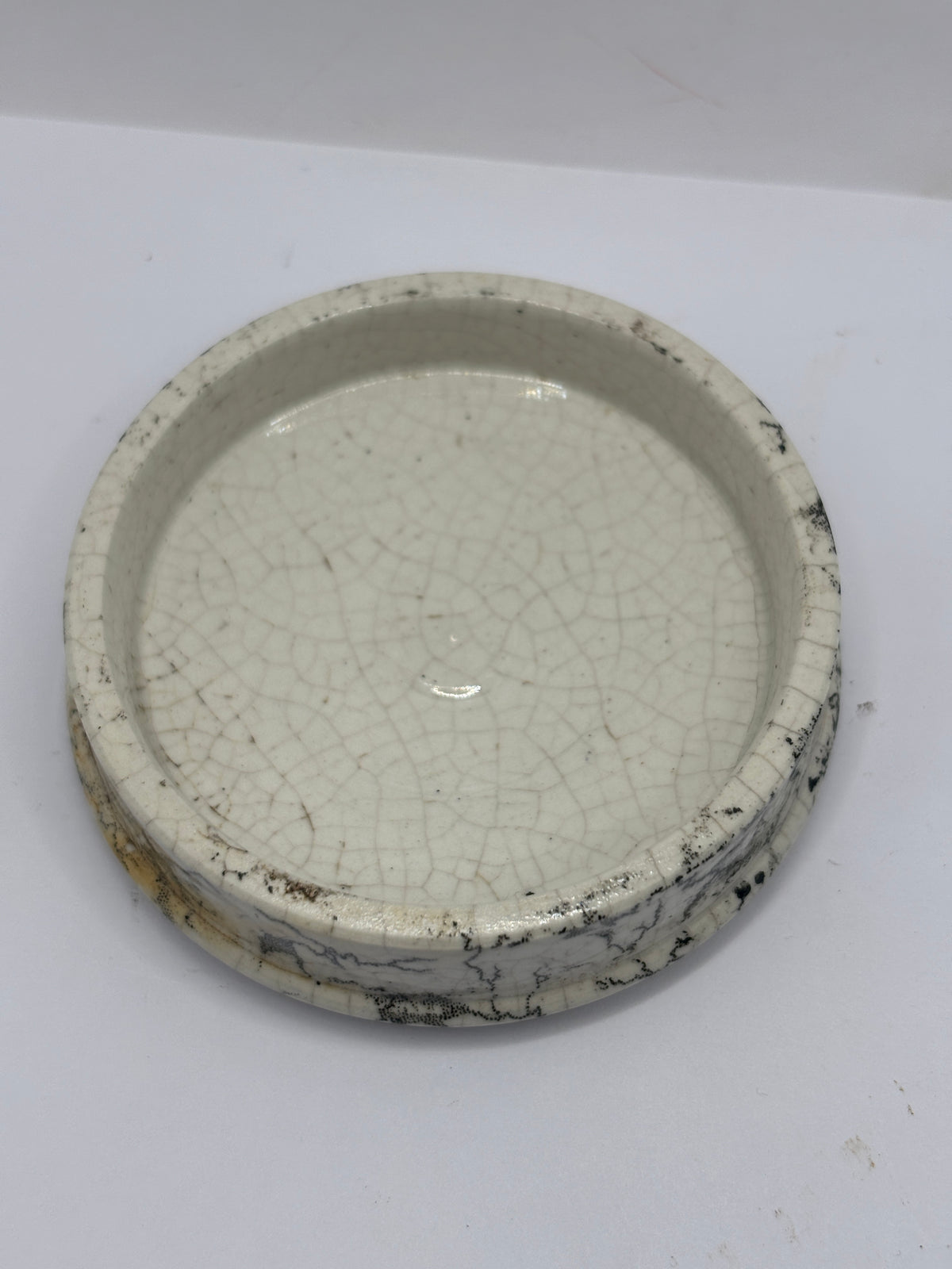 Old damaged lid, oriental toothpaste