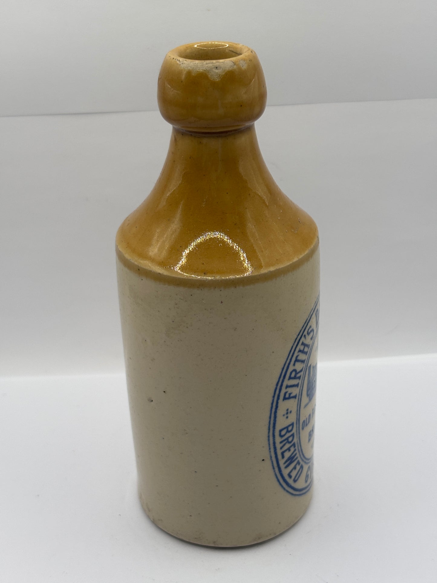 Old blue print stoneware ginger beer bottle, Firth’s Darlington brewed ginger beer