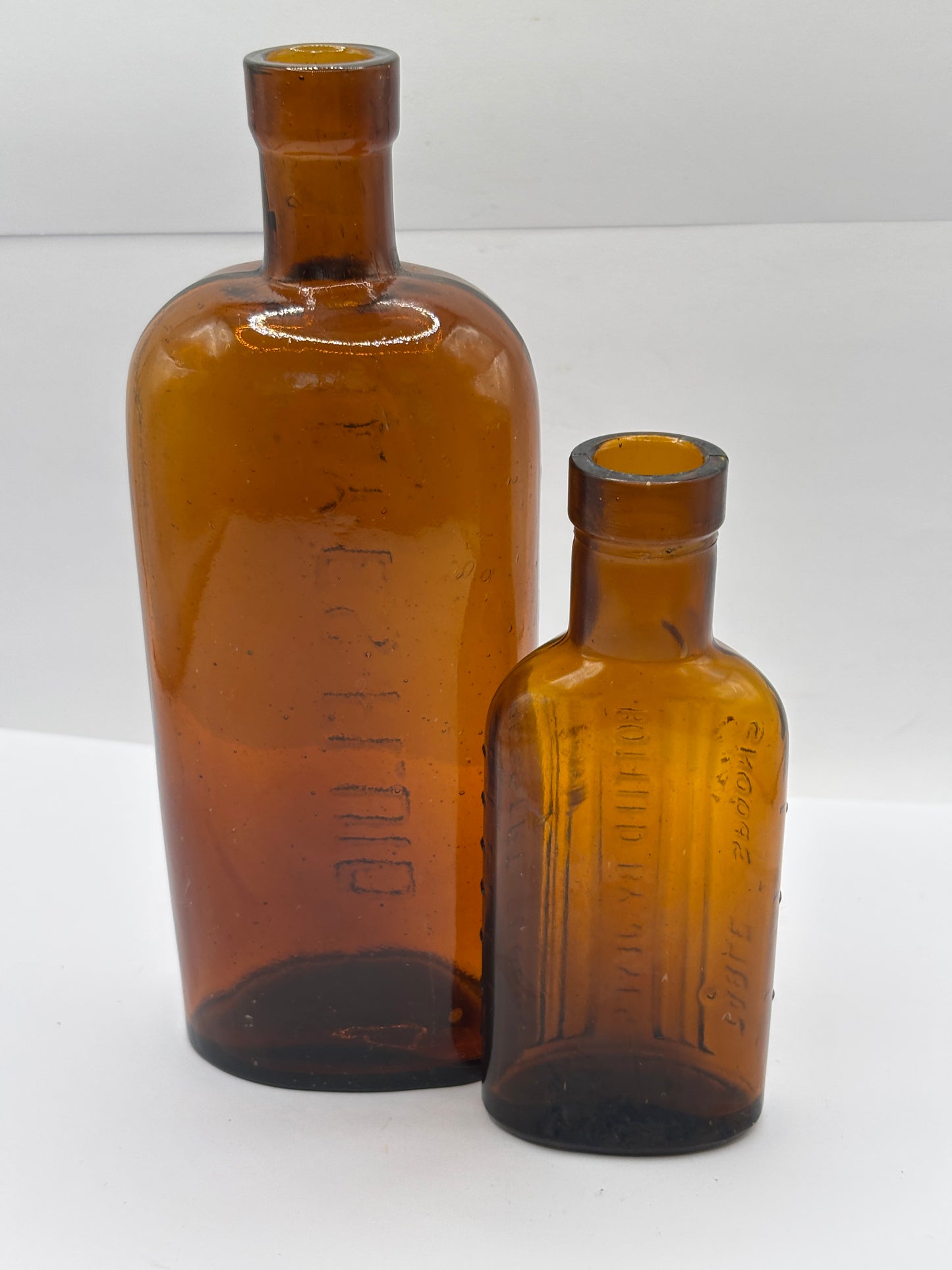 2 Old amber glass Jeyes fluid bottles