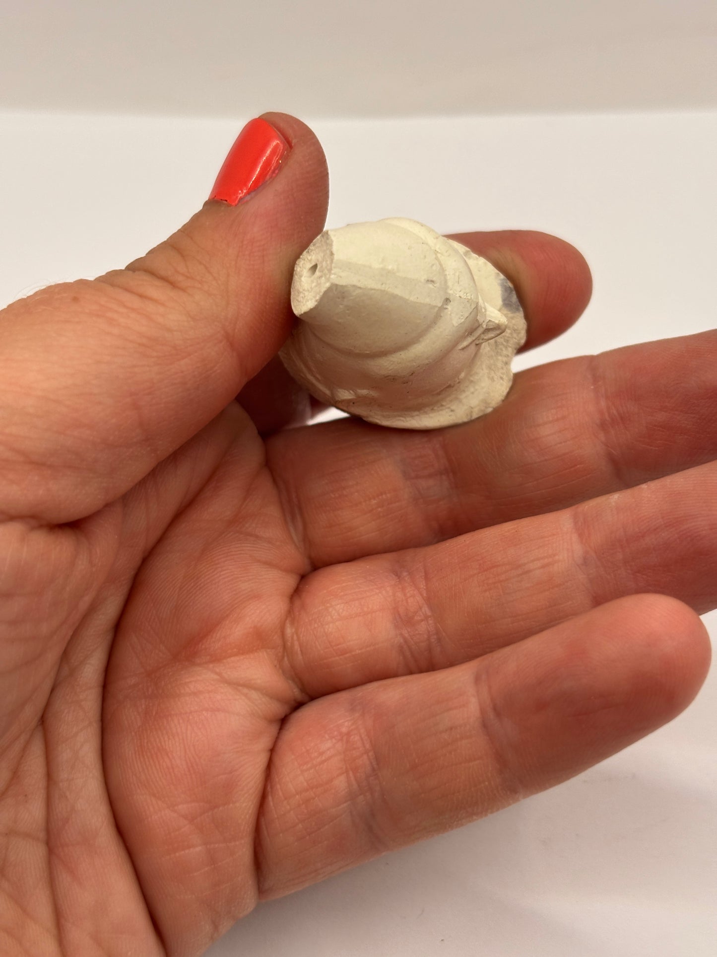 Old figural clay pipe head, pipe bowl
