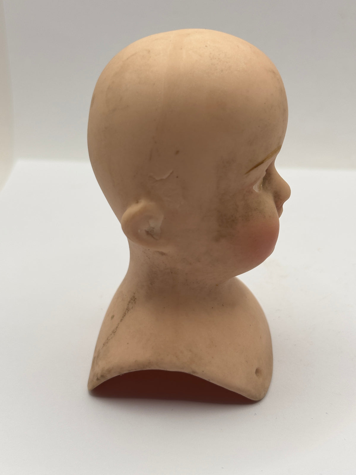 Old dolls head 9cms