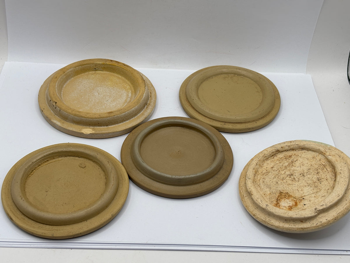 5 old stoneware lids, stackers