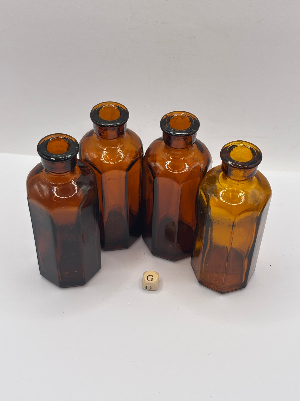 4 Old amber glass medicine bottles (G)