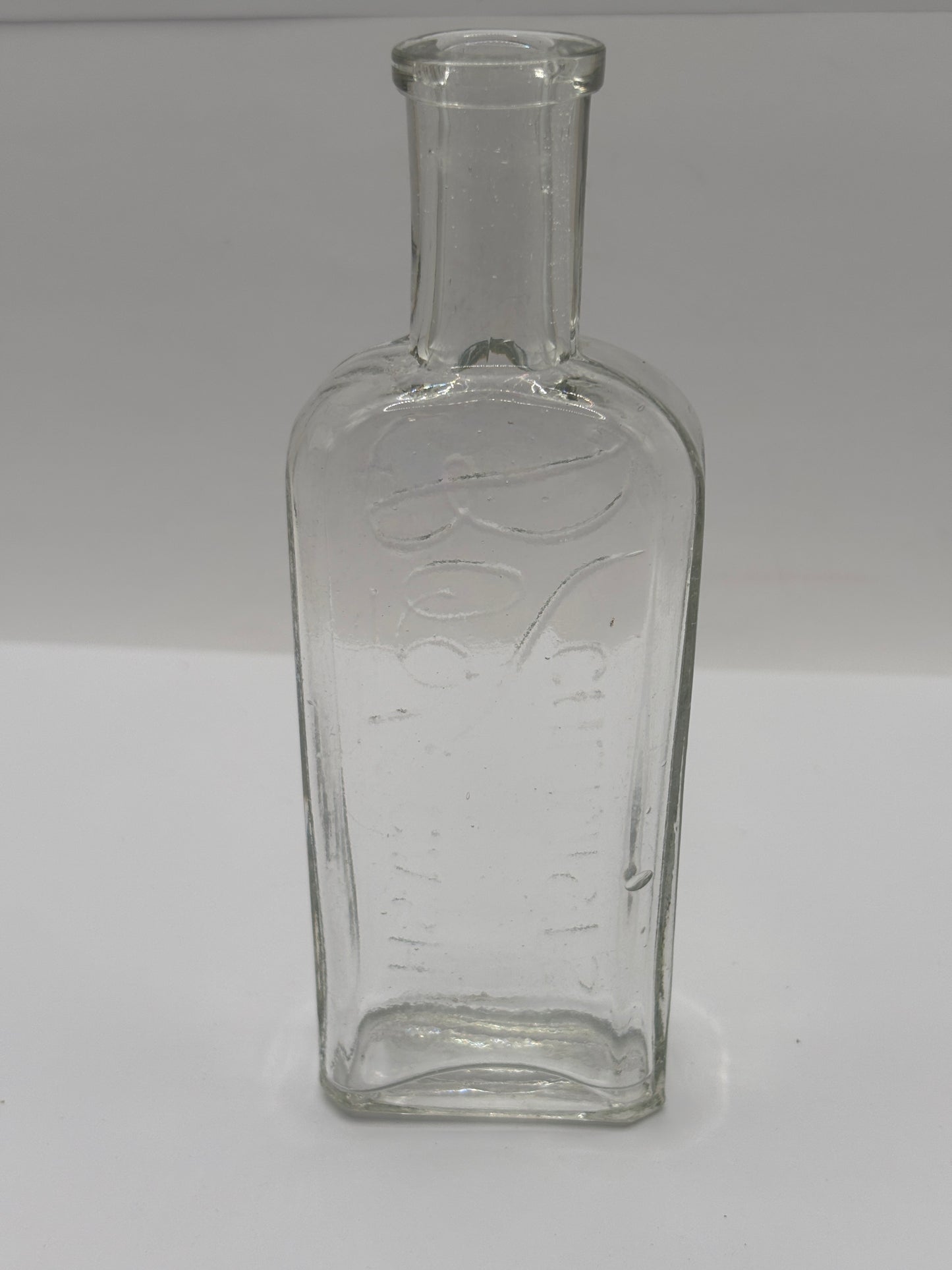 Old clear glass Boots cash chemists bottle