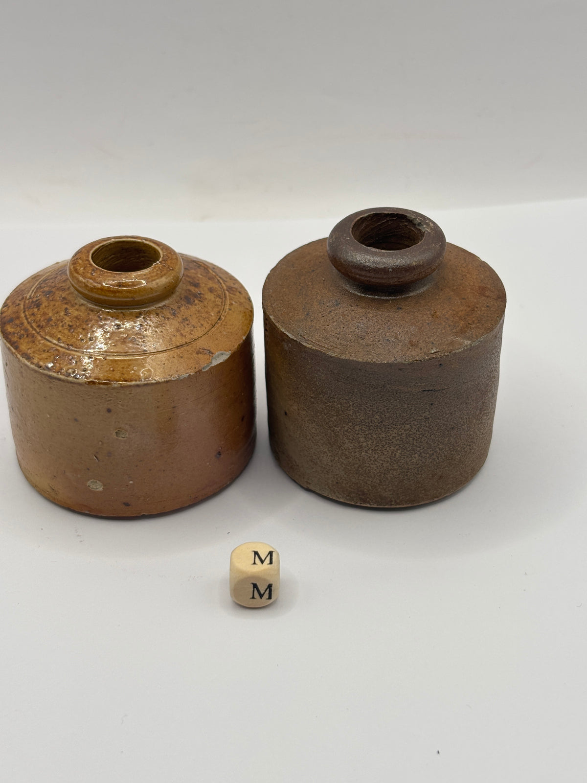 2 old brown stoneware ink bottles, inks. Pork pie ink (m)