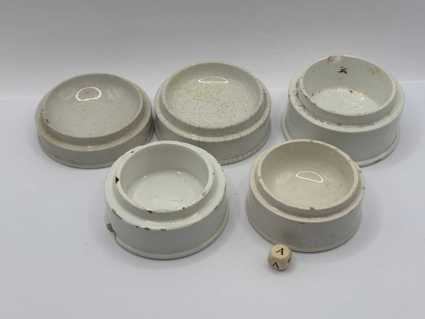 5 pot lid bases/risers/stackers (a)