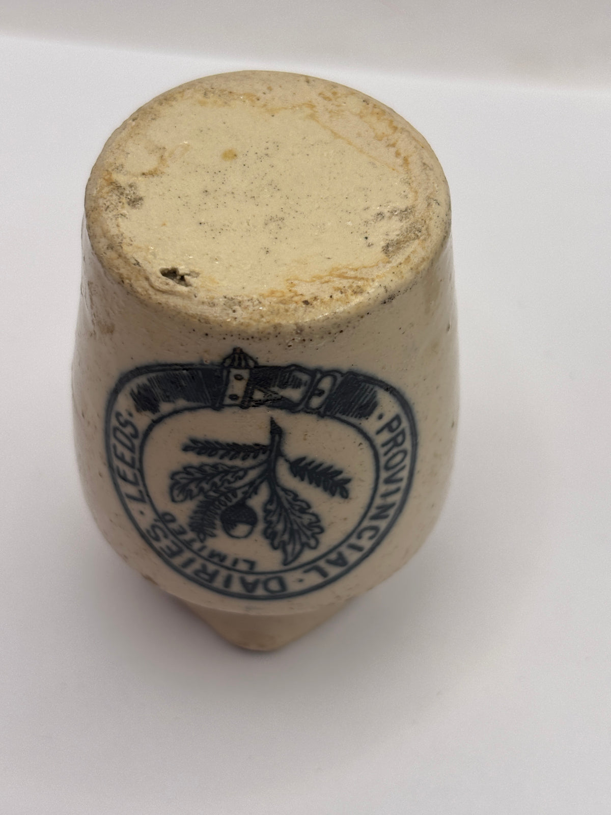 Old advertising cream pot, Provinical dairies Leeds. Chipped