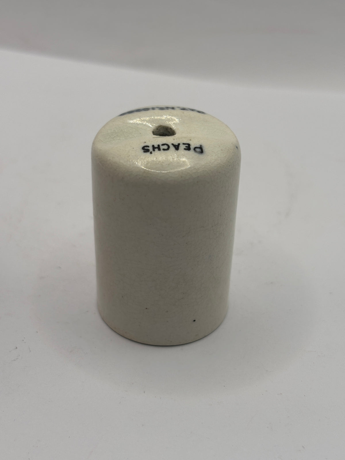 Old small stoneware peach’s mustard dispenser