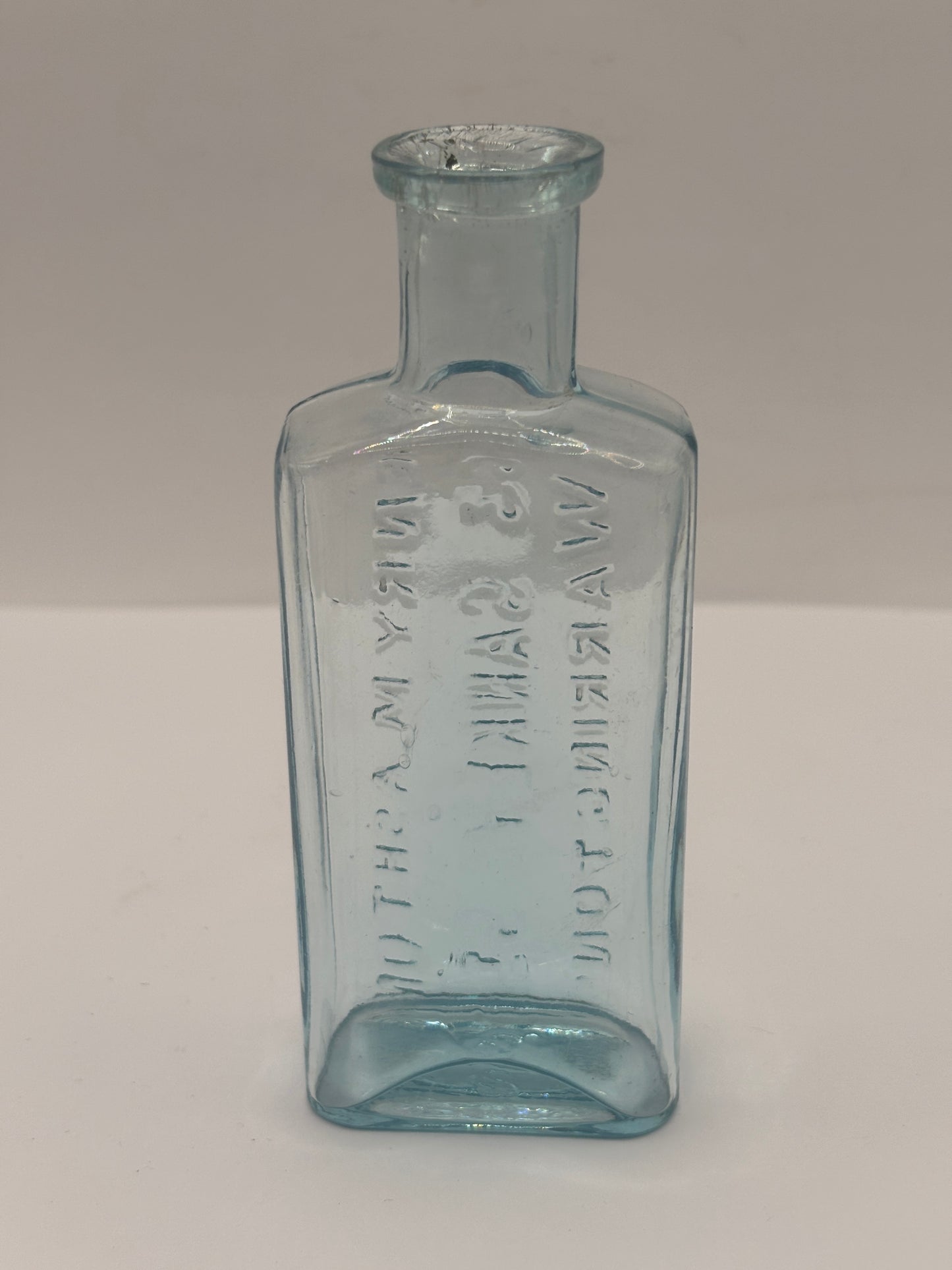 Old glass advertising chemist bottle, Warrington