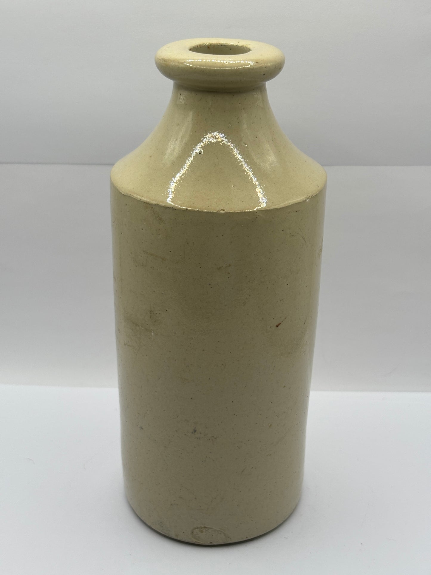 Old large advertising stoneware bottle. Bee brand