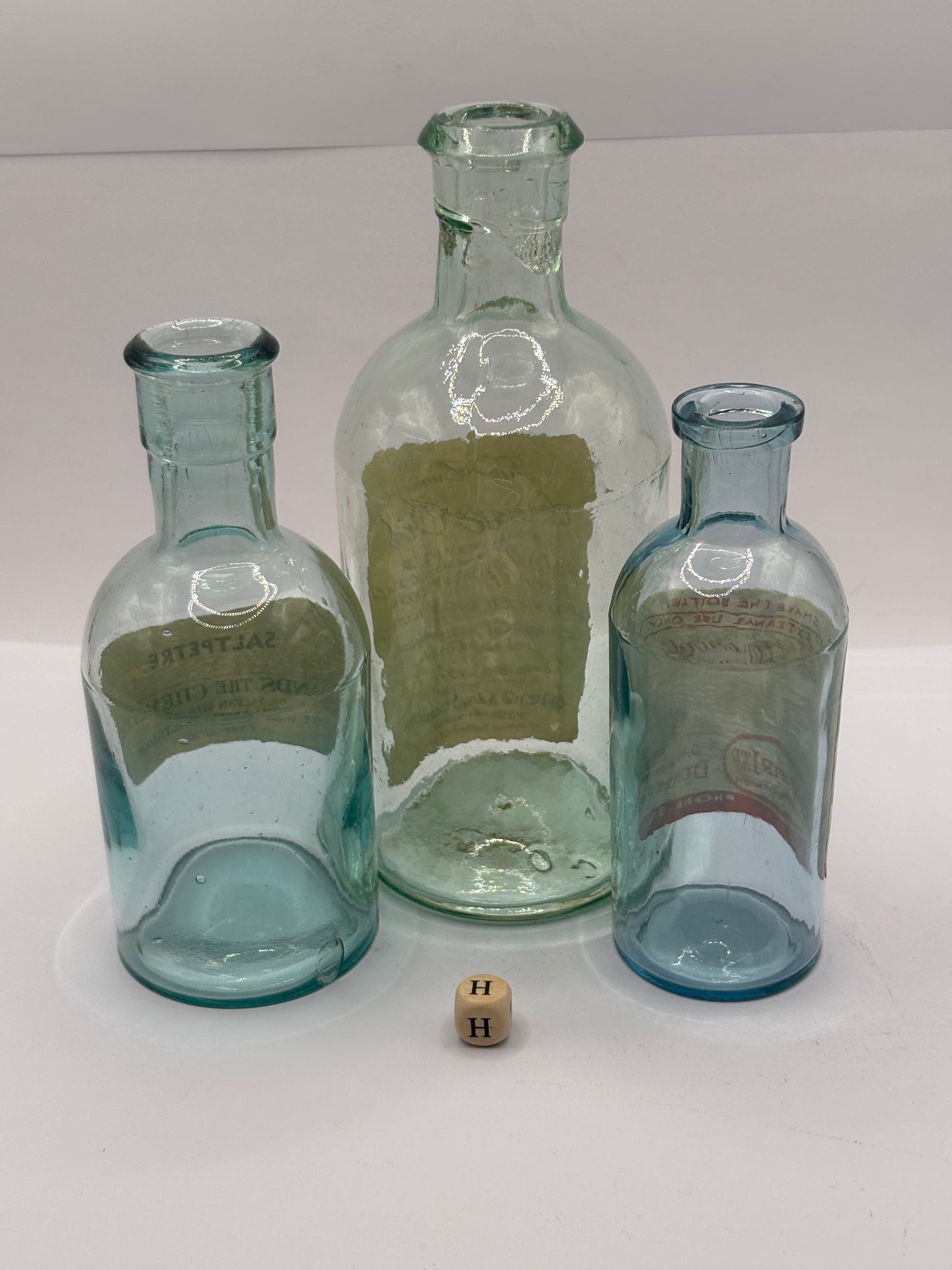 3 old chemist bottles with added labels (H)