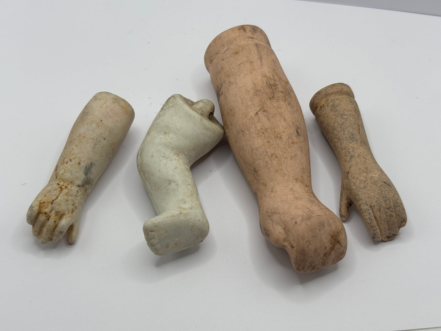 Old dolls body parts