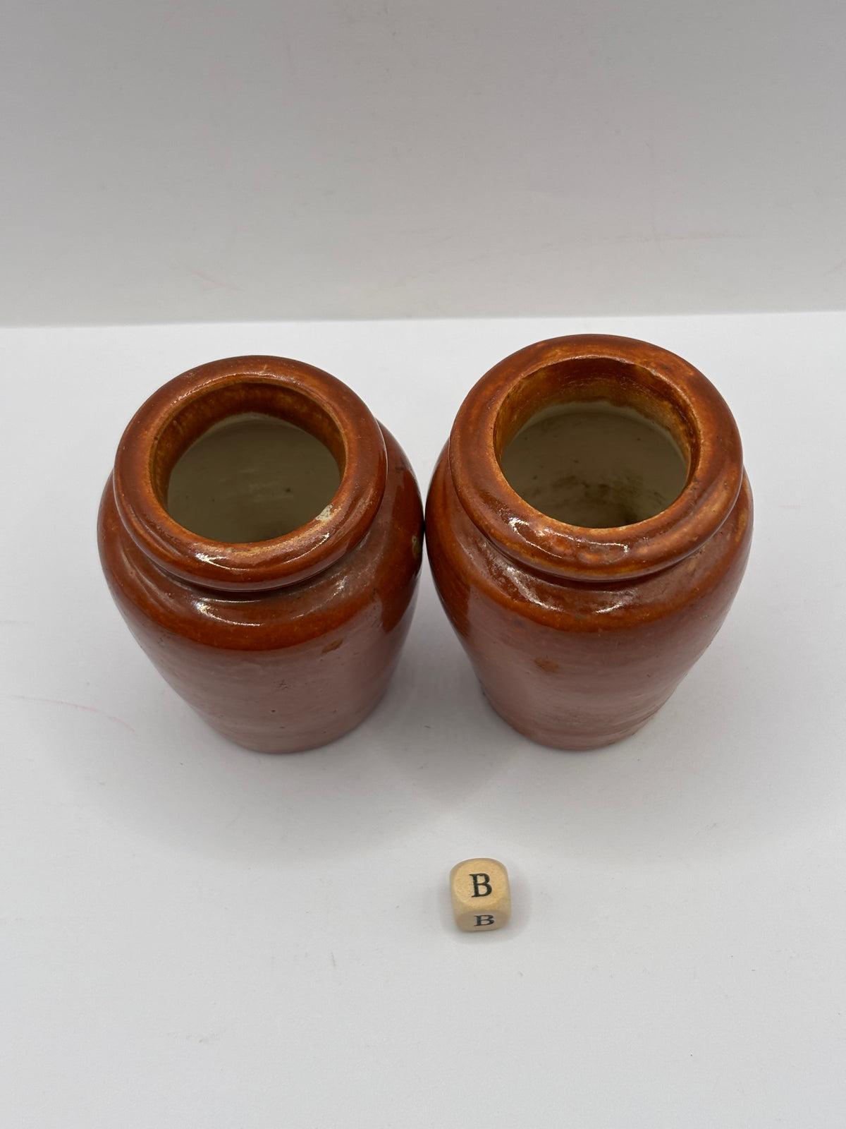 2 Old brown stoneware cream pots (B)