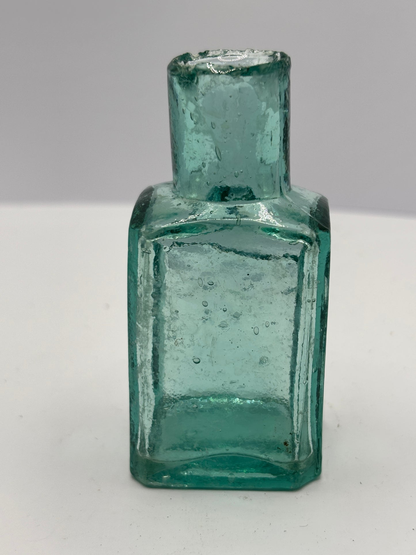 Old aqua glass Lion Brand ink, ink bottle, inkwell