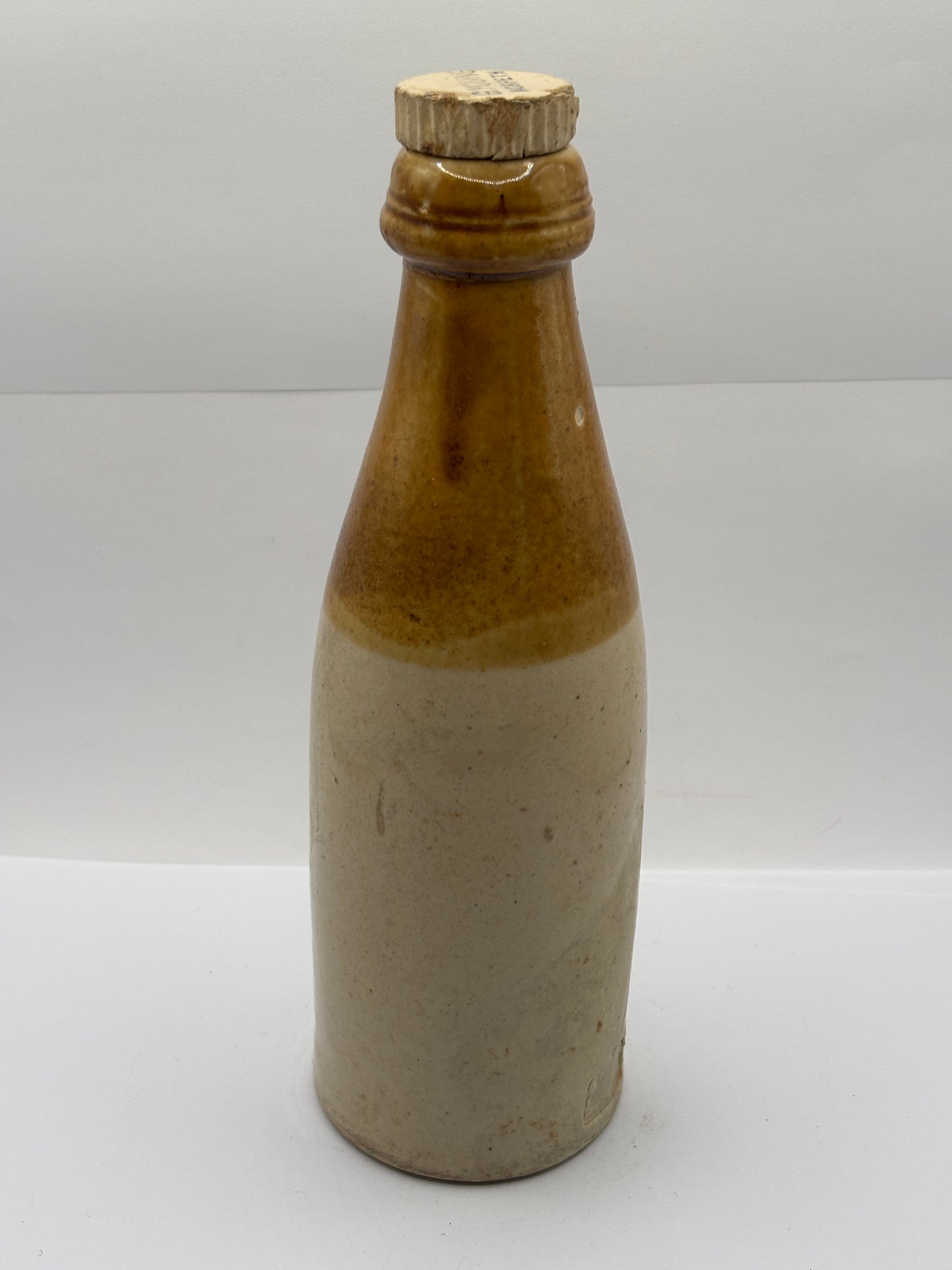 Old stoneware ginger beer bottle, George Young. Morpeth brewed ginger beer. Original stopper