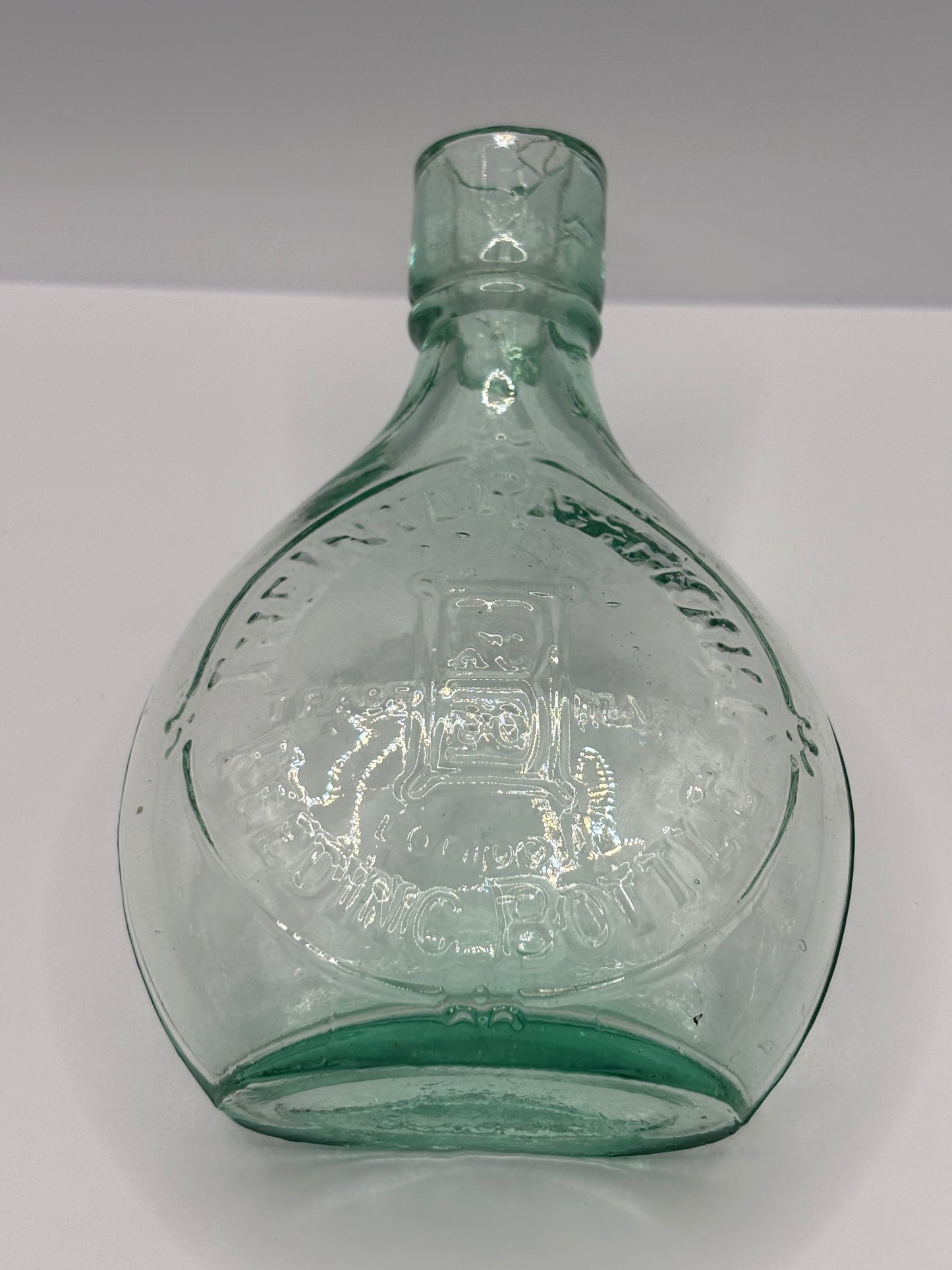 Old aqua glass baby feeder. The international feeder