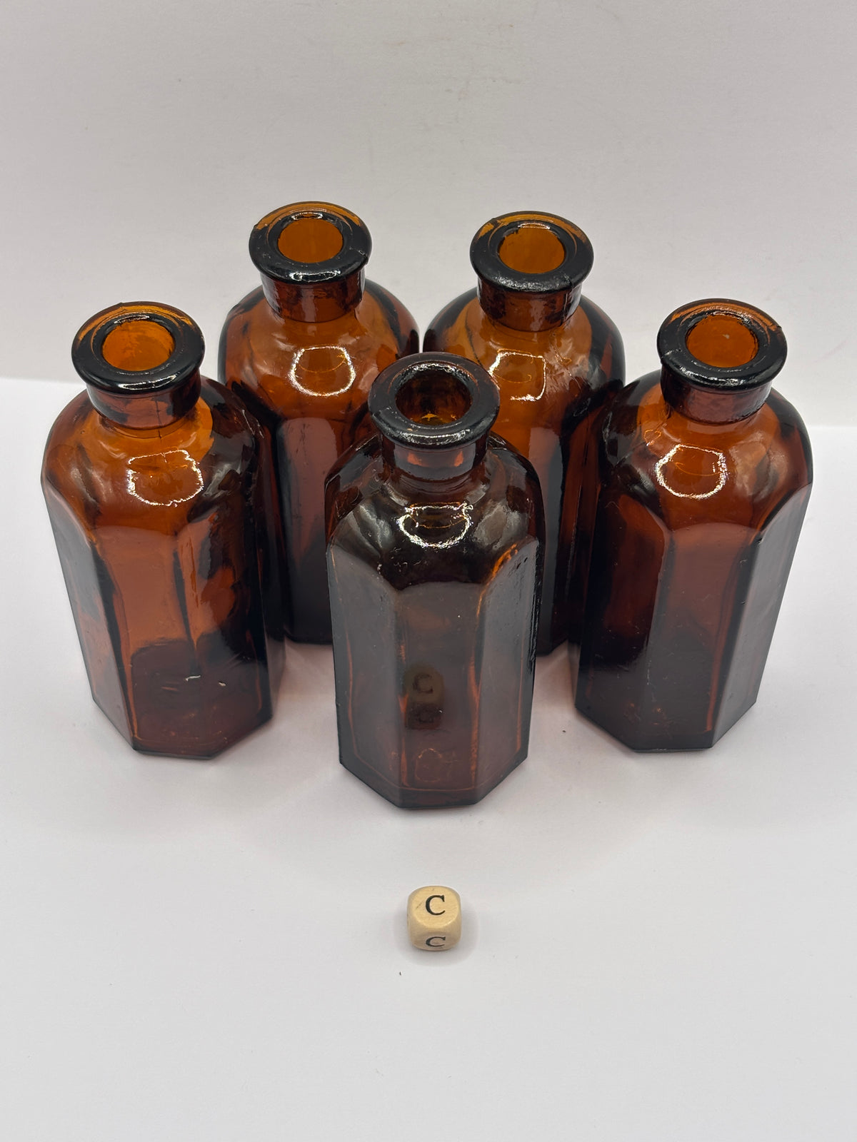 5 Old amber glass medicine bottles (C)
