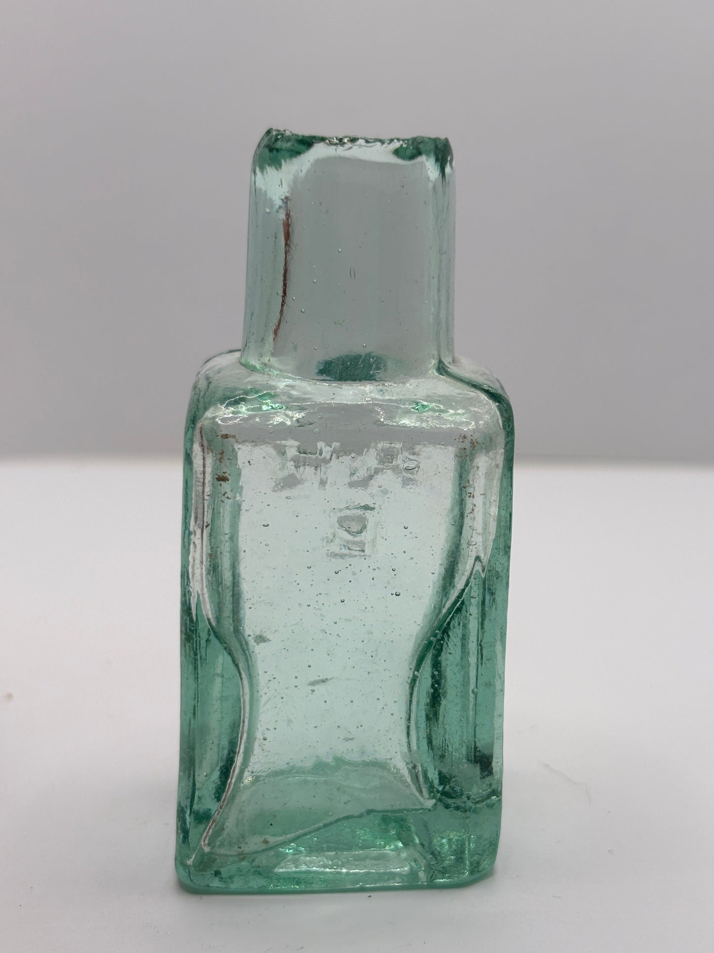Old aqua glass advertising ink & gum bottle, inkwell. AHB